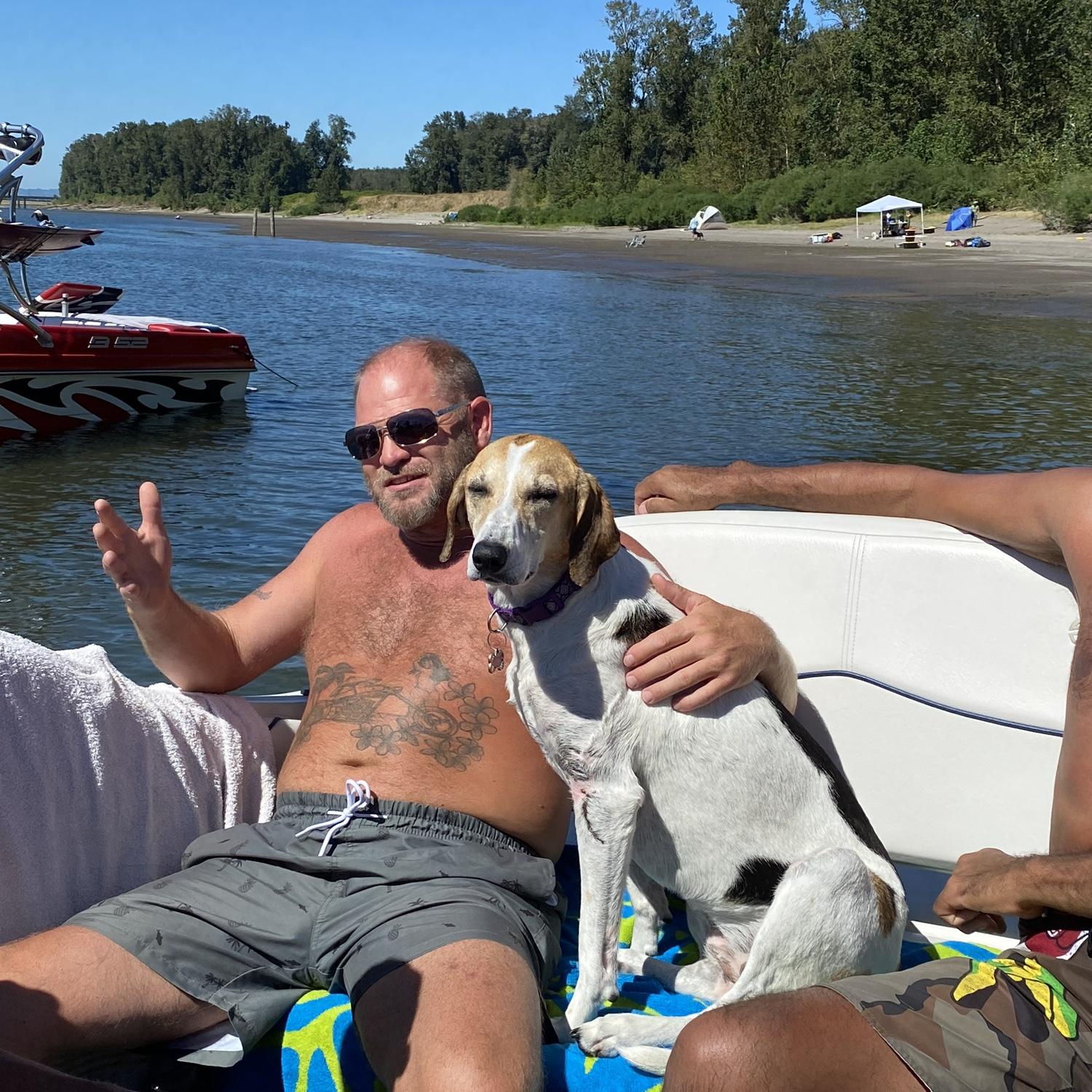 Chilling with dad and friends on the boat, September 2022.