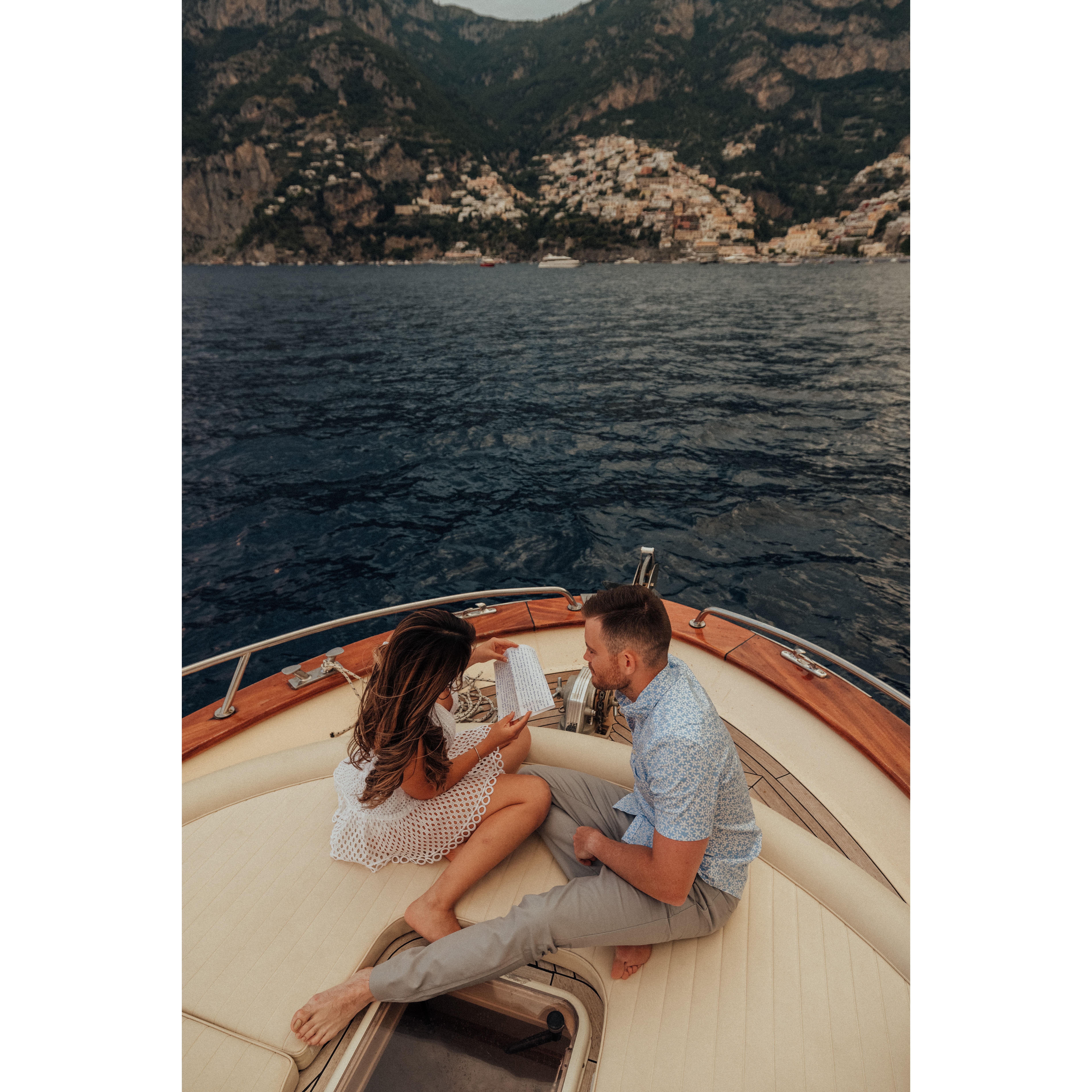 Betty reading the letter Alberto wrote to her.