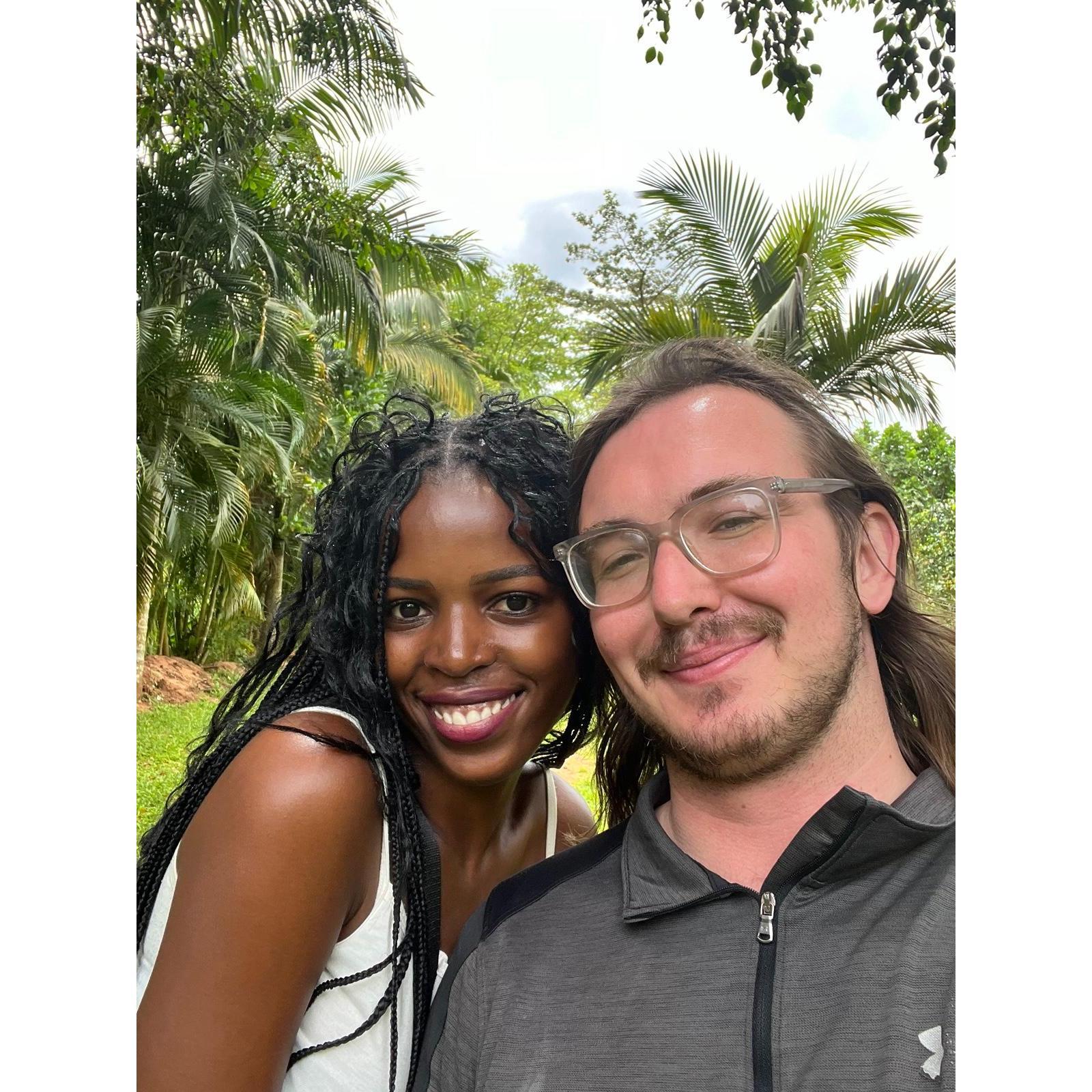 David and Shivan at a garden in Wakiso