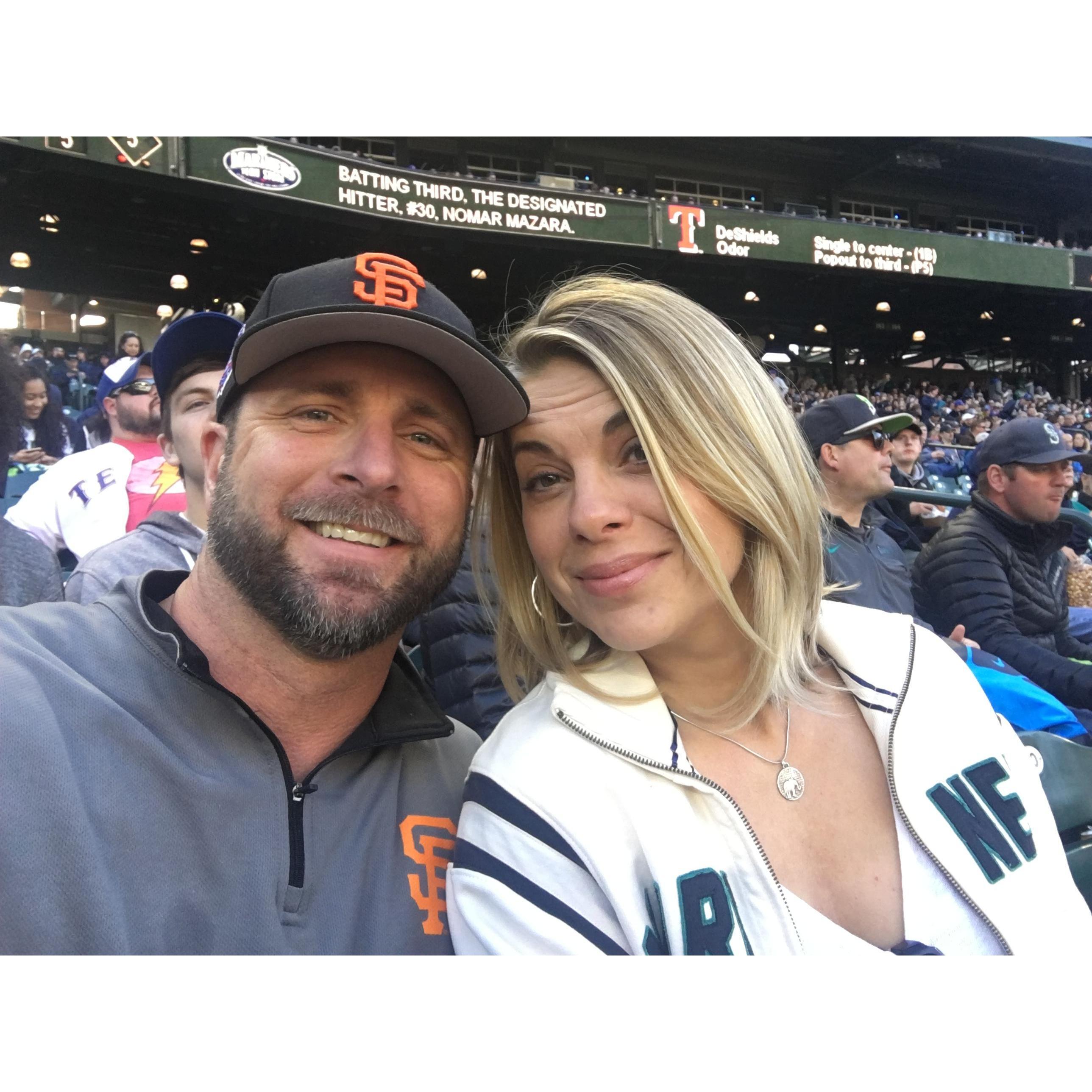 Look at how happy he is dragging me to baseball stadiums.