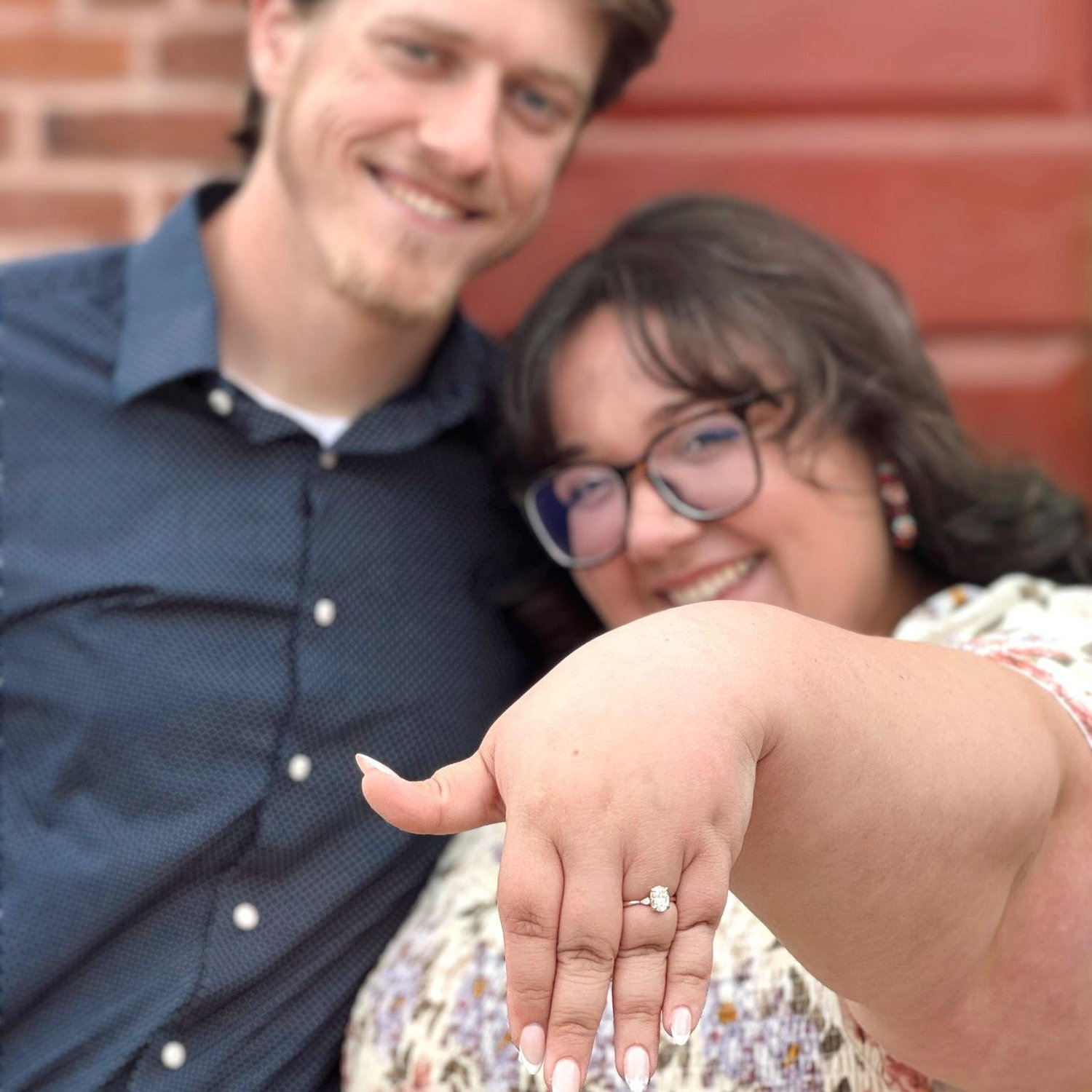 Our friend Chelsea snapped this photo on the front steps of our church the morning after we got engaged. It's the photo we used to tell the social media world that WE'RE GETTING MARRIED!