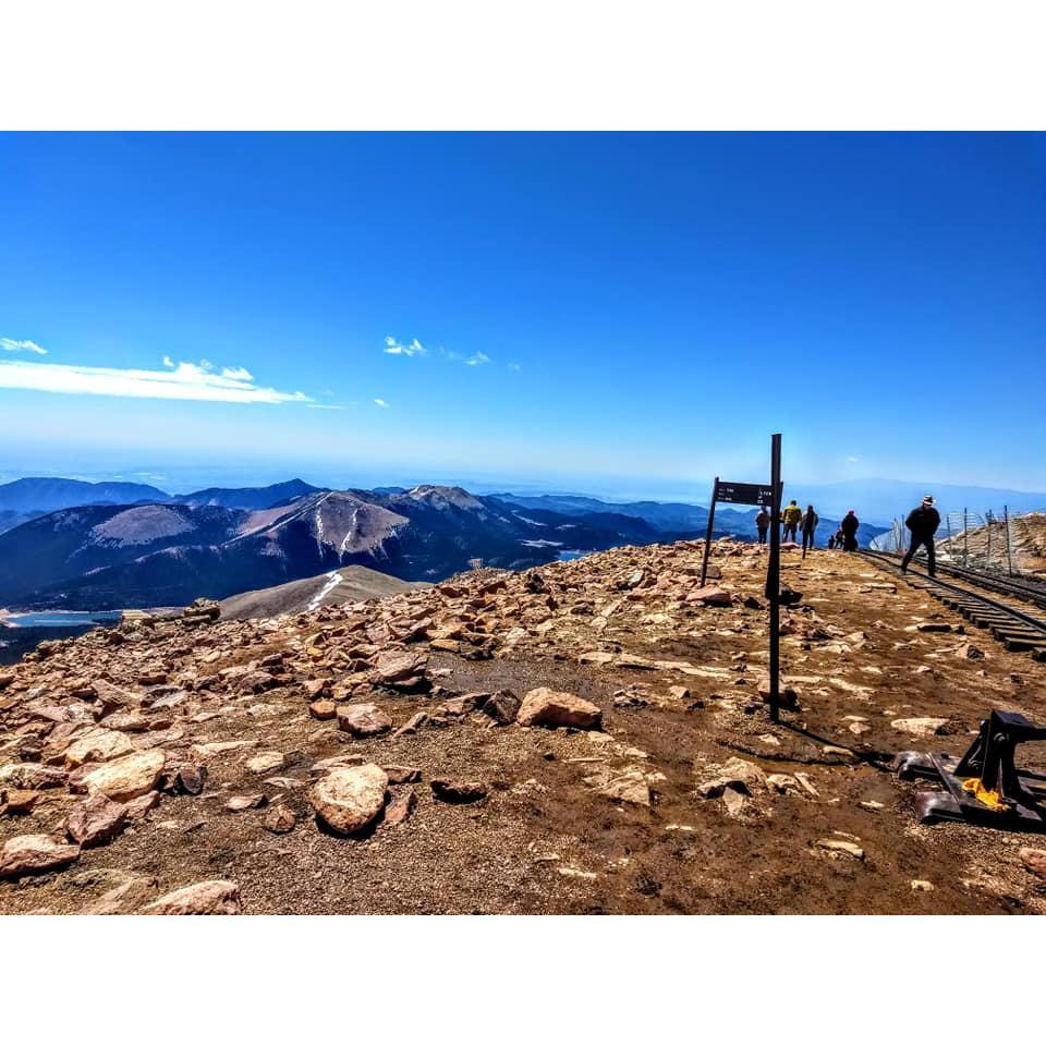 At the top of Pike's Peak it was more than love that took their breaths away. The altitude is more than 14,000 feet above sea level. Ps. Don't listen to a thing they say about the donuts up there.