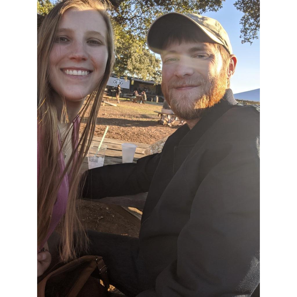 Enjoying a cocktail and friends' company at Treaty Oaks Distillery-- December 2019
