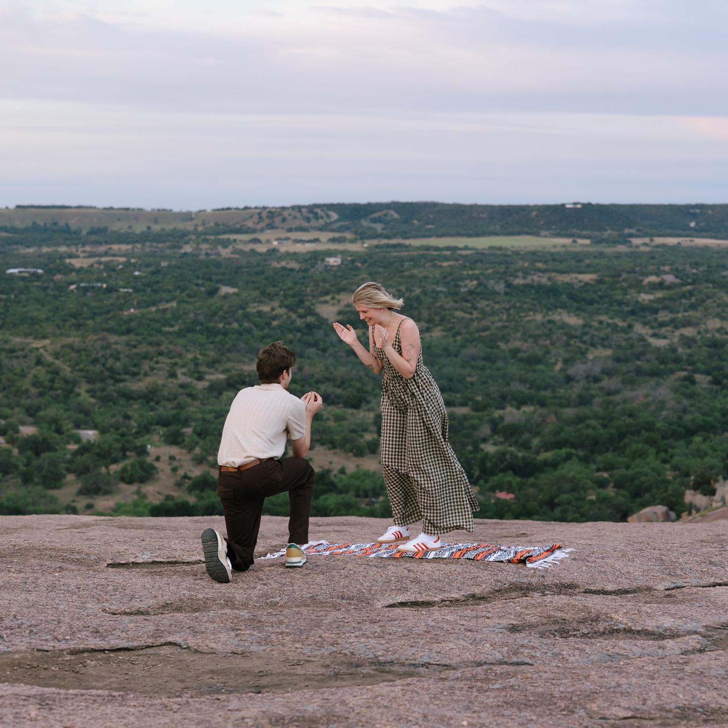He proposed at Enchanted Rock on May 21st, 2025. A magical day🩷