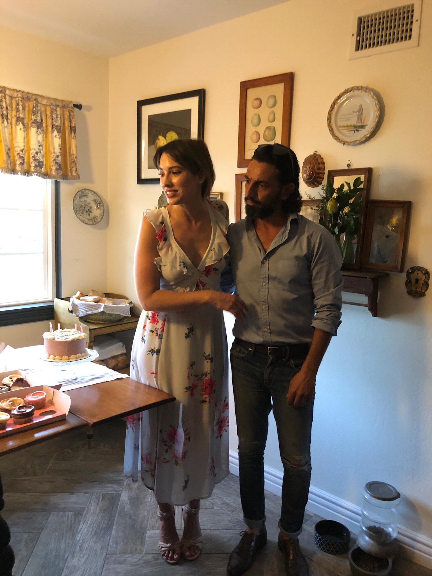 Admiring the desserts and thanking everyone who attended the engagement party at the bride’s childhood home.