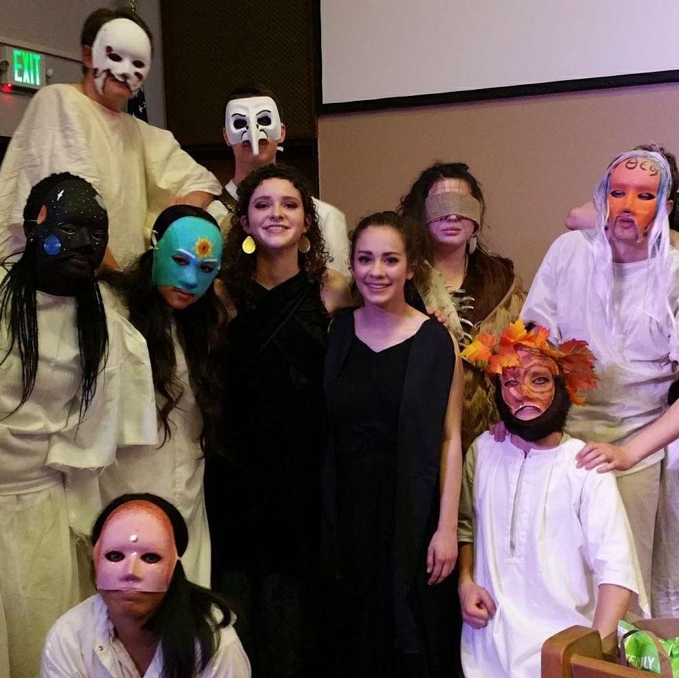 2019: Addie was astonished to learn, years later, that Peter had apparently started trying to stand by her whenever anyone took a photo! Can you find Peter in this ominous cast photo from ‘Antigone?’