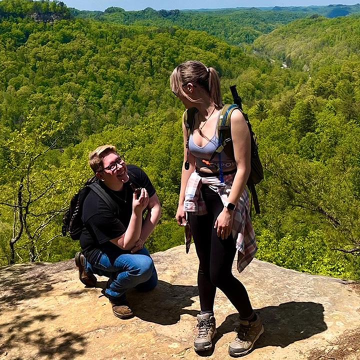 Rachel proposing on top of Lovers Leap at Red River Gorge on May 4th, 2023