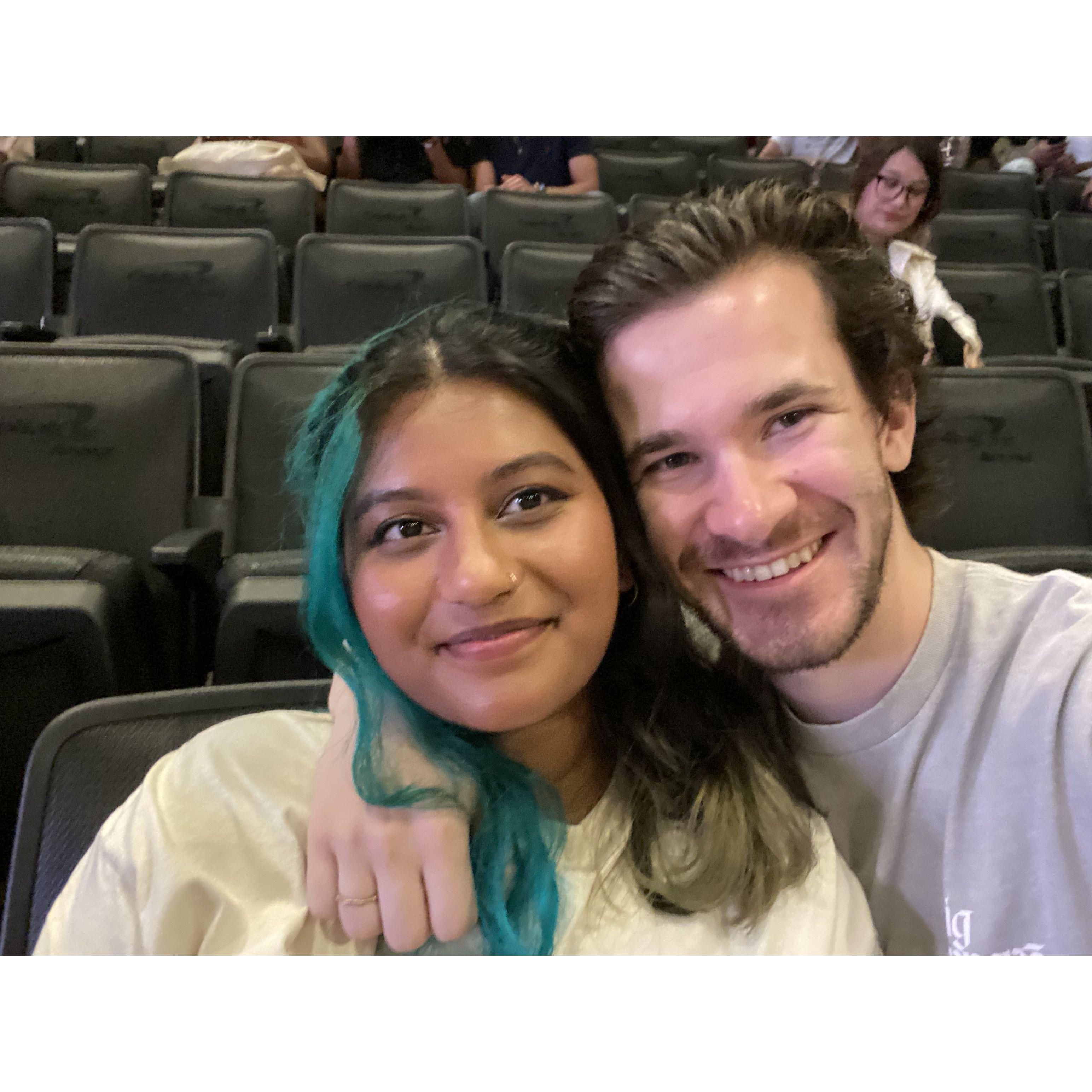 Taken at a concert! Together, James and Faizah have seen: Taylor Swift (2x), AJR, Kendrick Lamar, Lil Nas X, Lewis Capaldi, Kehlani, The 1975, Baby Keem, Ludovicio Einaudi, and Big Time Rush!