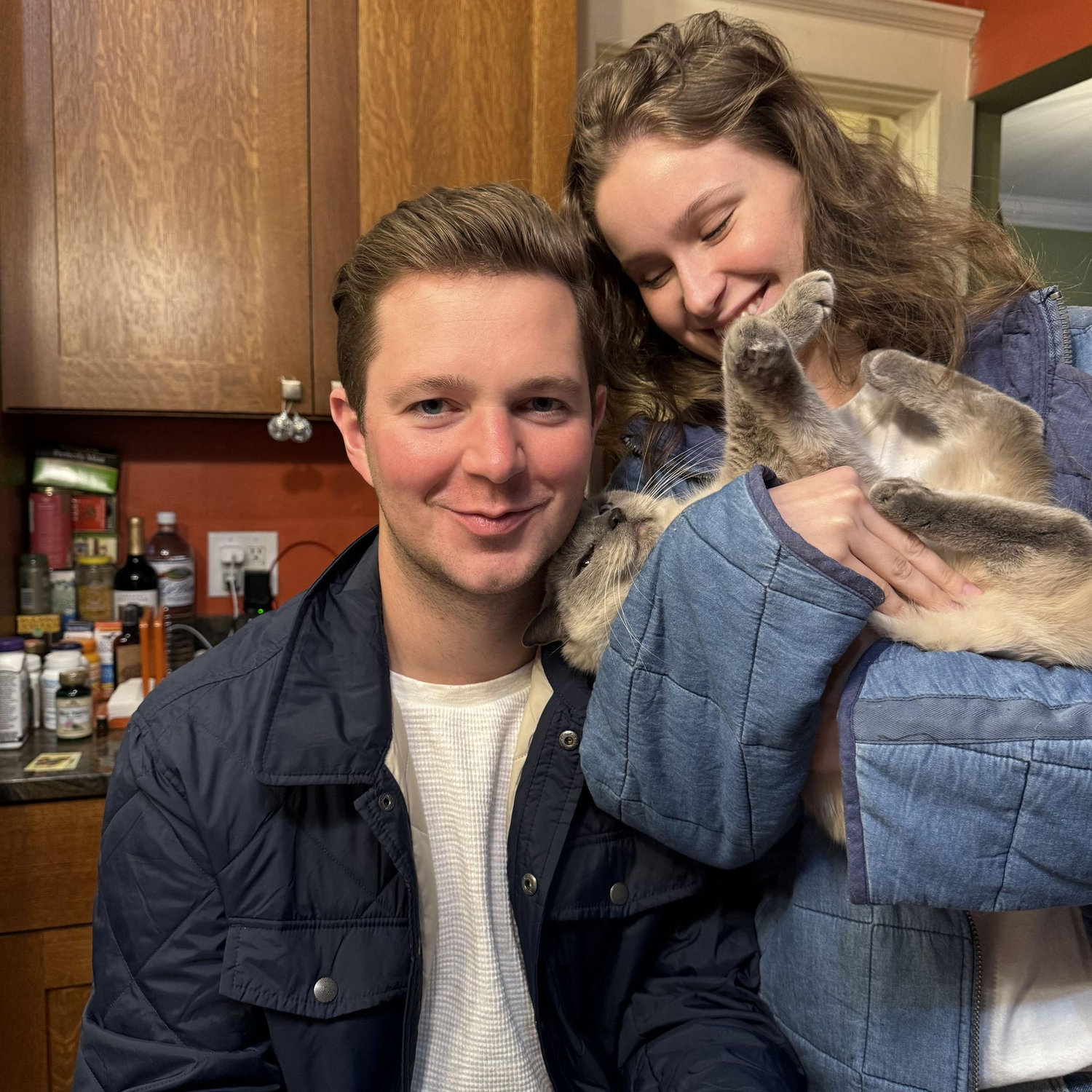 He told me AFTER we took this picture that he is in fact allergic to cats. Zero self preservation instincts.
