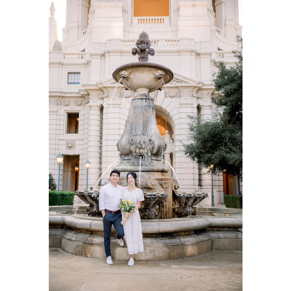 Sam and Yena in front of a water fountain. May their love flow everlasting!
