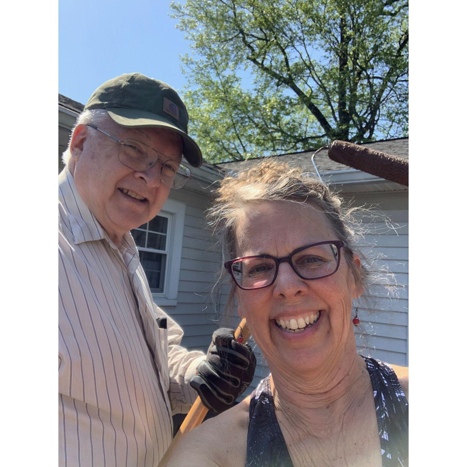 Helping each other on home improvements has become a theme. Here, staining Amy's deck--one step closer to the sale of her home in Cramerton, NC.