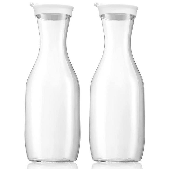 NETANY 50oz Water Carafe with Flip Top Lid, Clear Plastic Pitcher for Iced Tea, Juice, Lemonade, Milk, Cold Brew, Mimosa Bar - Juice Containers with Lids for Fridge - Set of 2