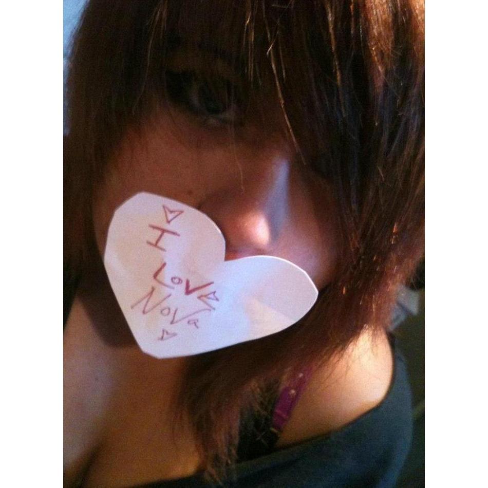 Me really small in high school this was my first I love you sign I did