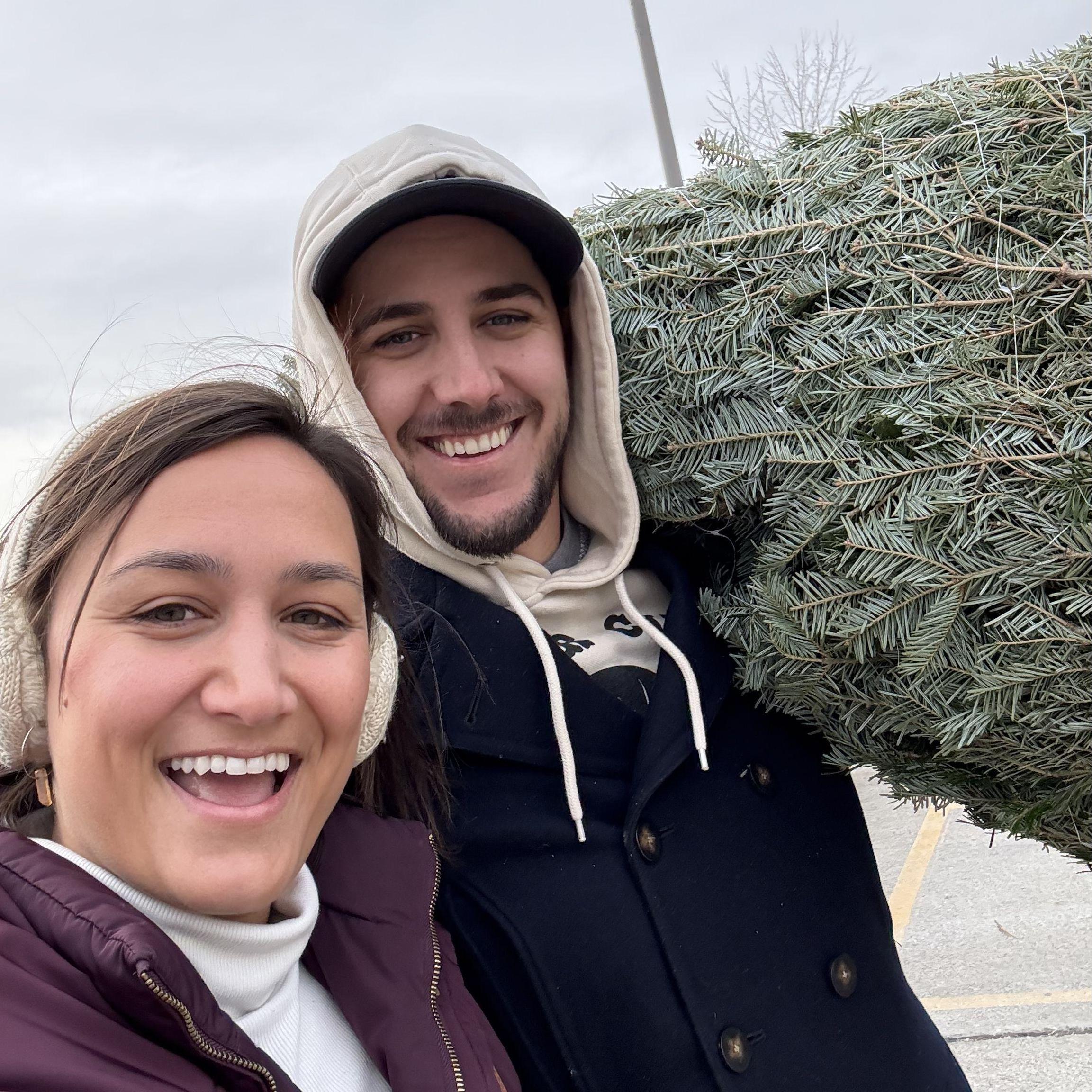 Buying our first Christmas tree together at Eastern Market