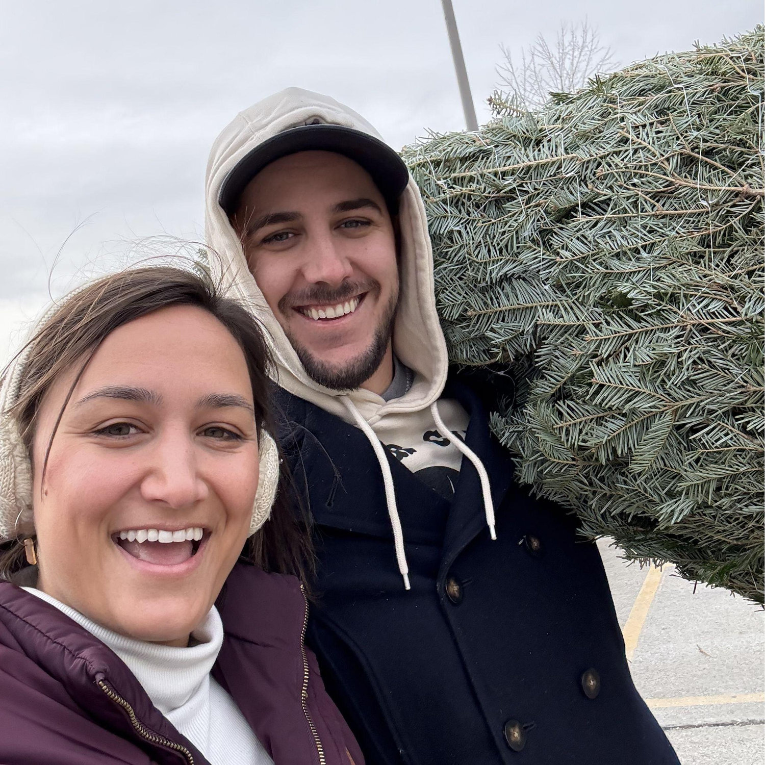 Buying our first Christmas tree together at Eastern Market