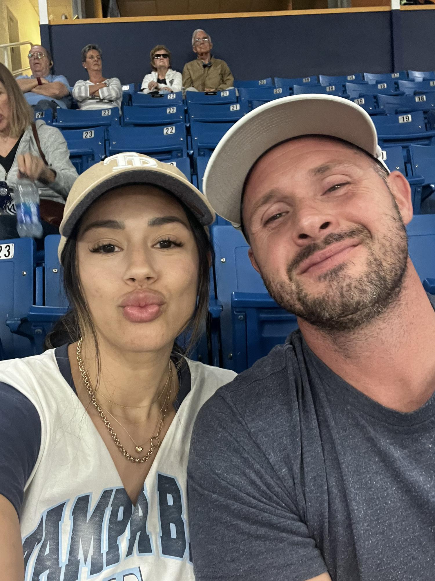 First Tampa Bay Rays game. Shortly after the bride delivered a Tampa Bay Rays player’s baby!