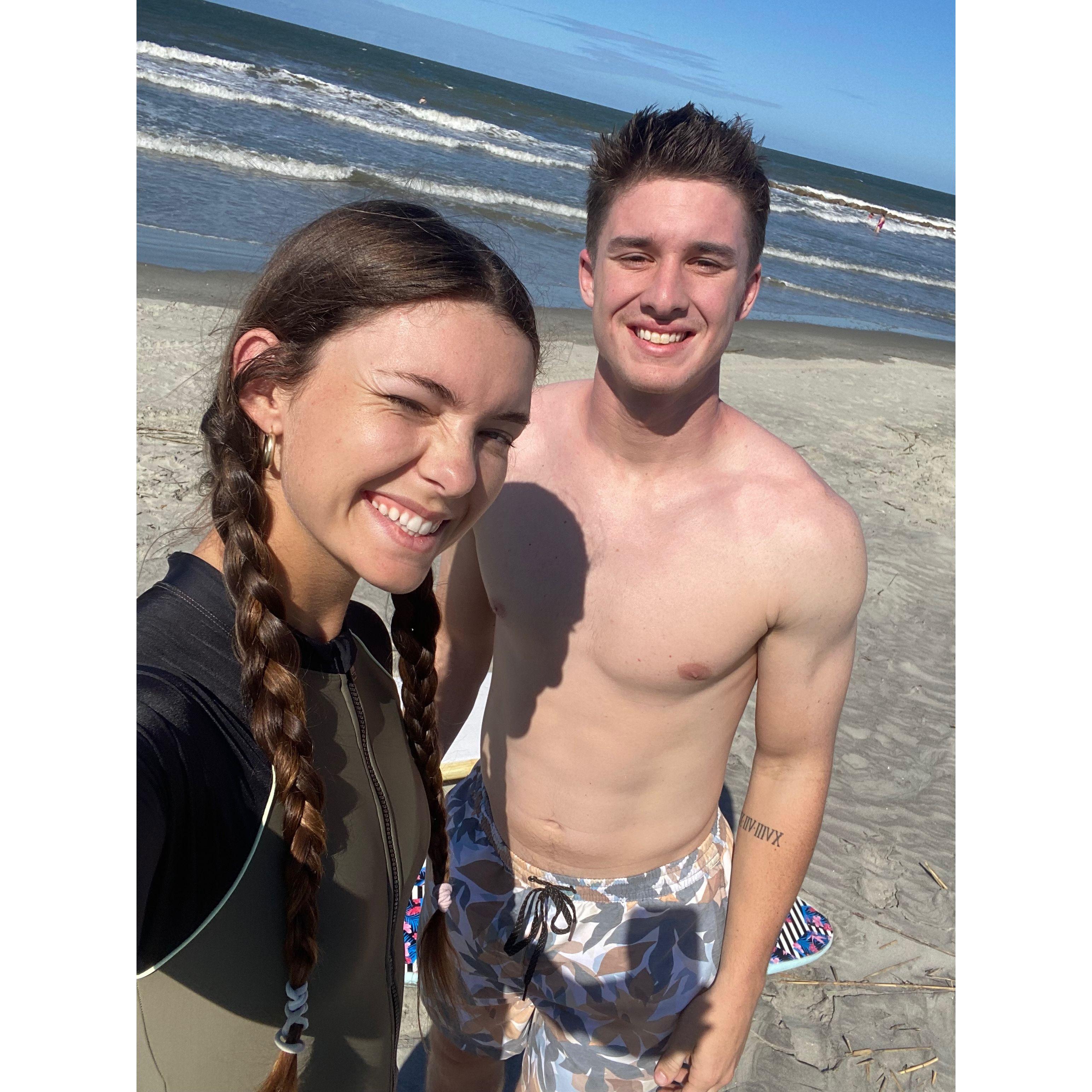One of us is a professional surfer and the other is learning, who's who?
