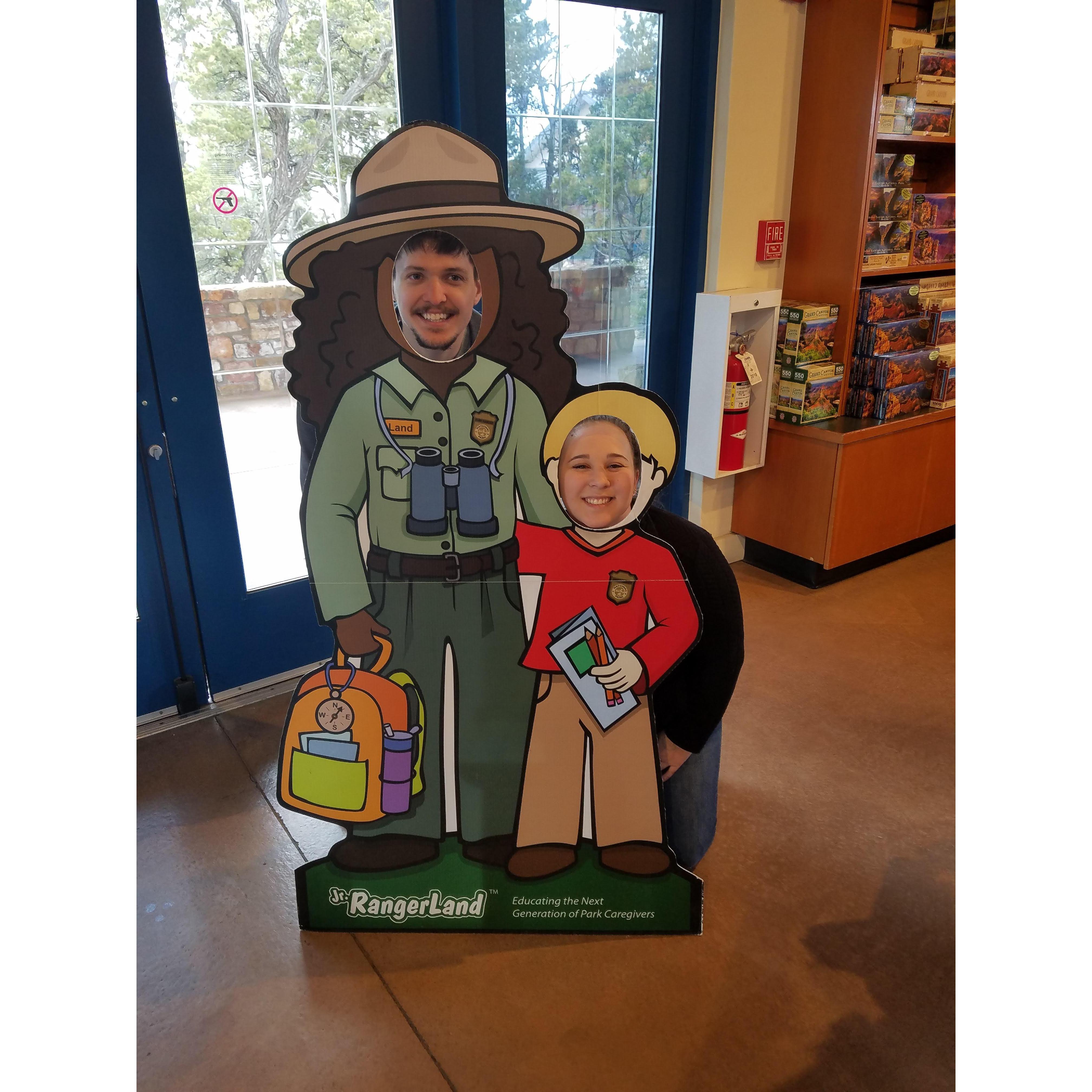 Dylan and Syd at the Grand Canyon! She barely had to bend down to fit :D
