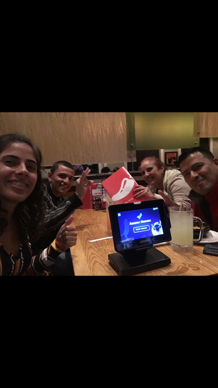 Daniel's first time in chili's with Griselys parents Ransamy and Grisselle.