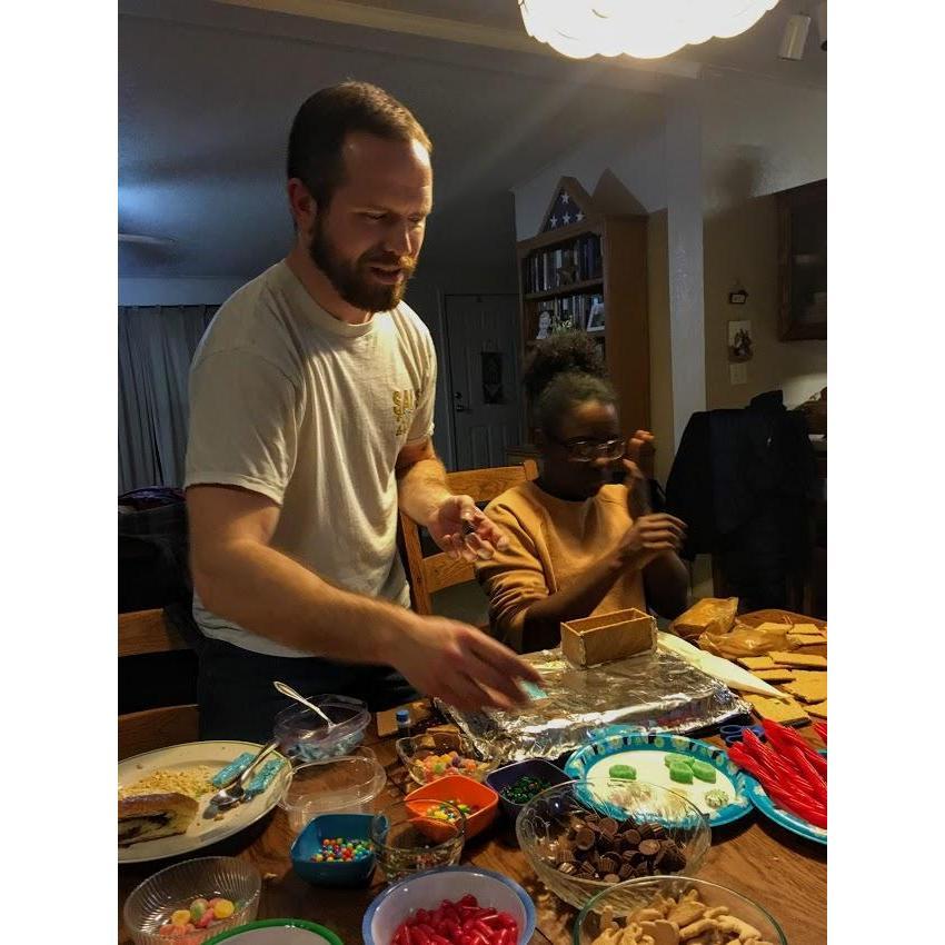 Steve getting hazed on New Years 2019 through the Annual Harris Family Gingerbread Building Competition... sorry we're not sorry.