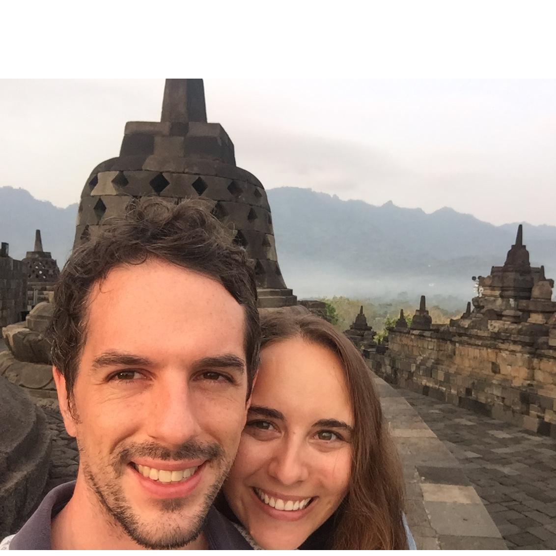 Rob proposed at the top of Borobudur temple in Indonesia at sunrise. There weren't any great photographers available to capture the moment, but we did our best.