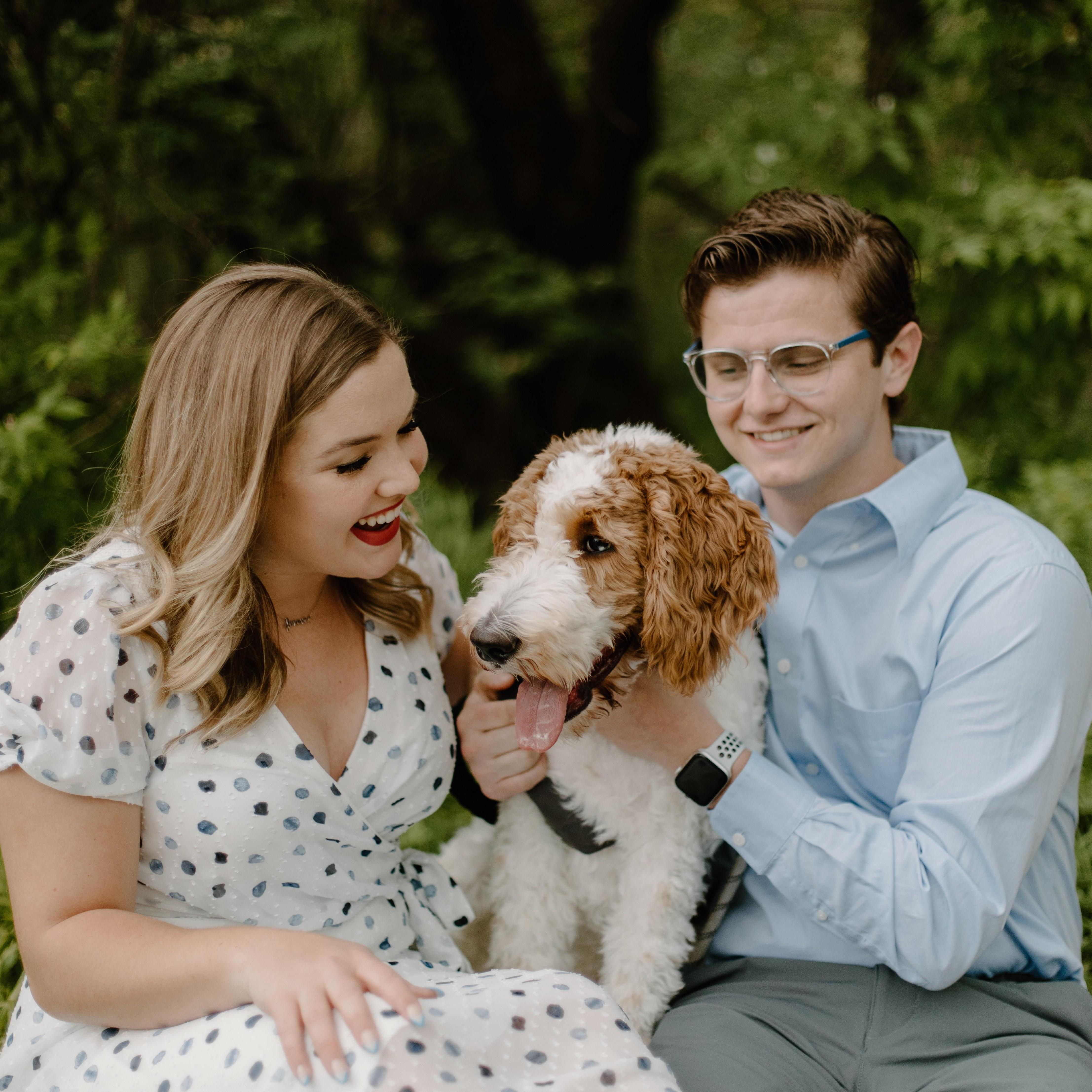 One of their engagement pictures with their puppy, Louie