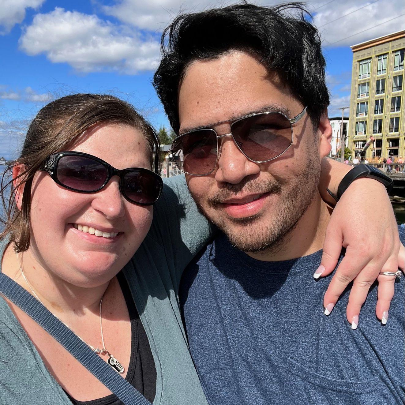 Our first photo of us being officially engaged. We celebrated with a trip to Olympia to attend a waterfront festival.
