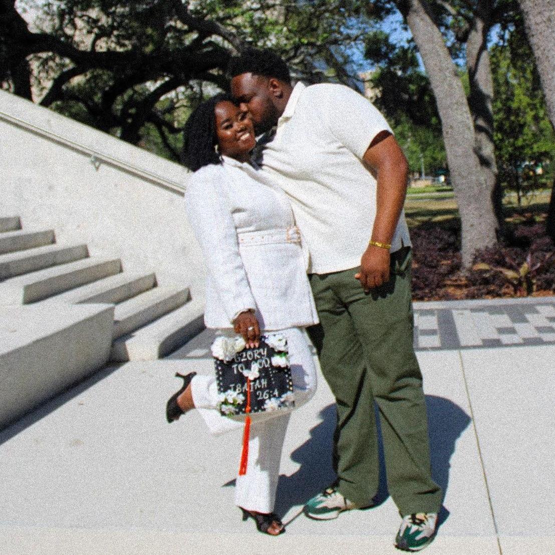 Sweet moment during Whitney's university graduation photoshoot!