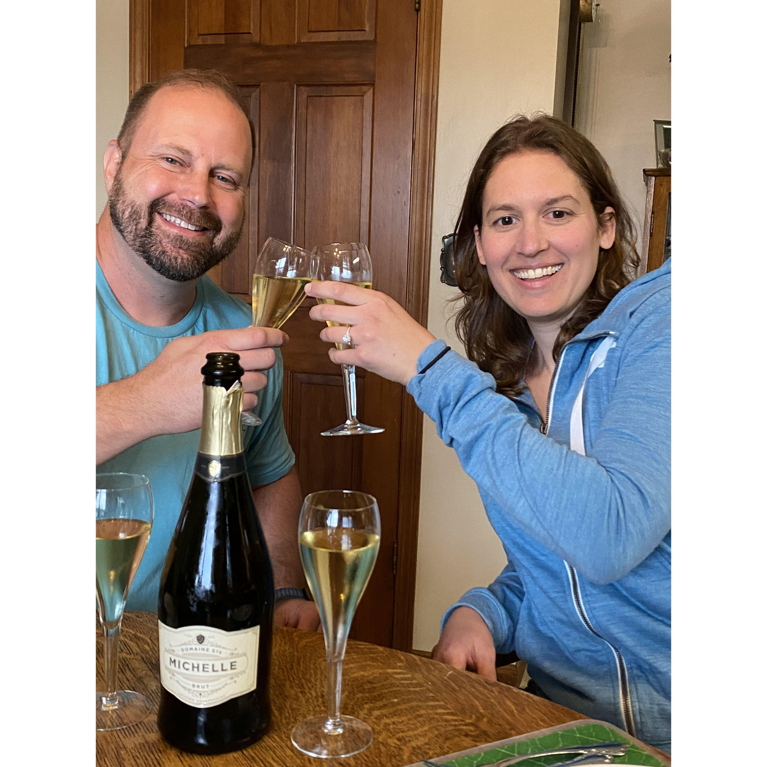 Toasting to our engagement, courtesy of Aunt Mickey and Uncle John!
