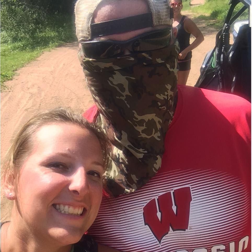 The photo bomber in the back is The Blonde Lion
