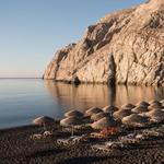 Swim at Black Sand Beach in Santorini