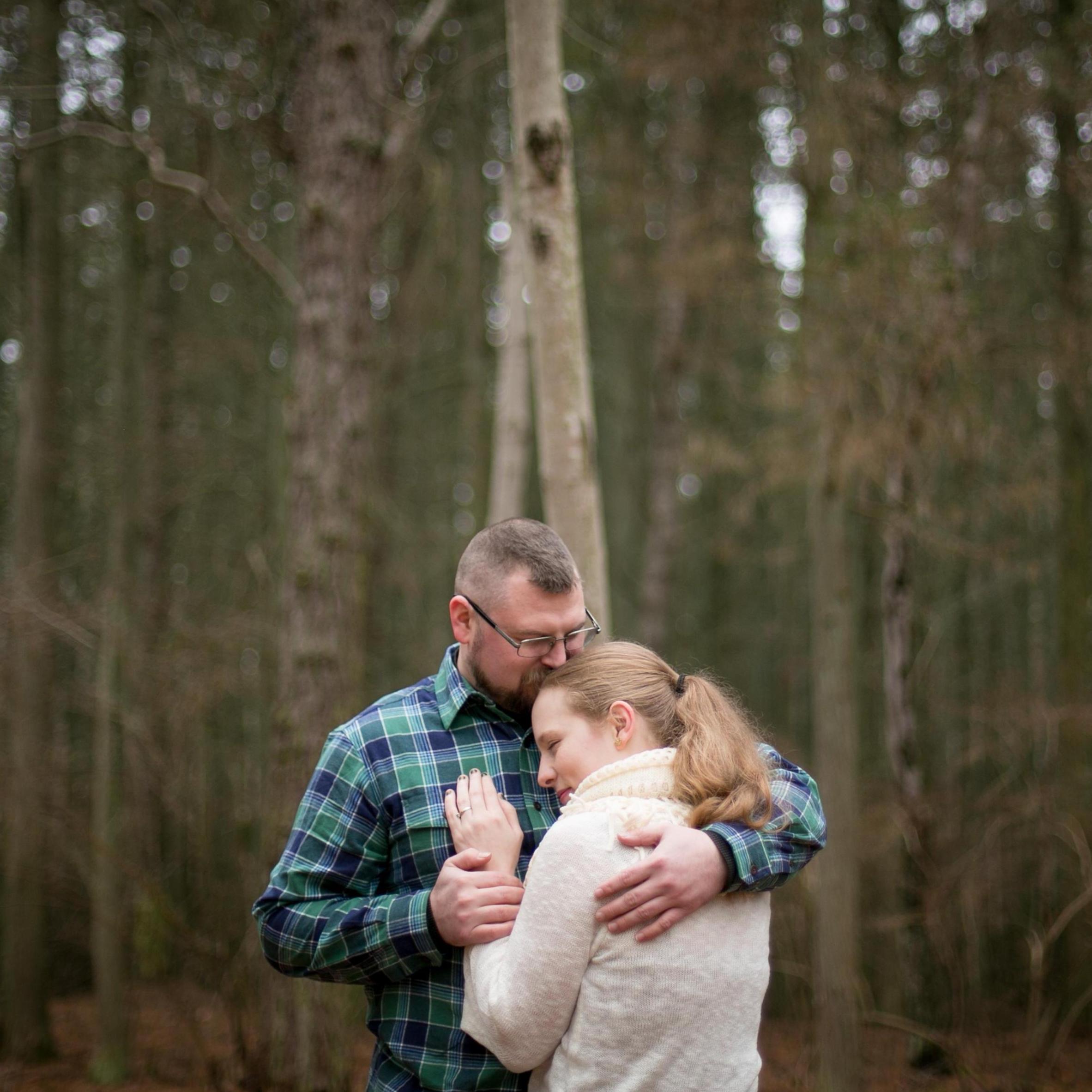Unknowingly we took this picture in front of a tree with a heart shaped knot in it.