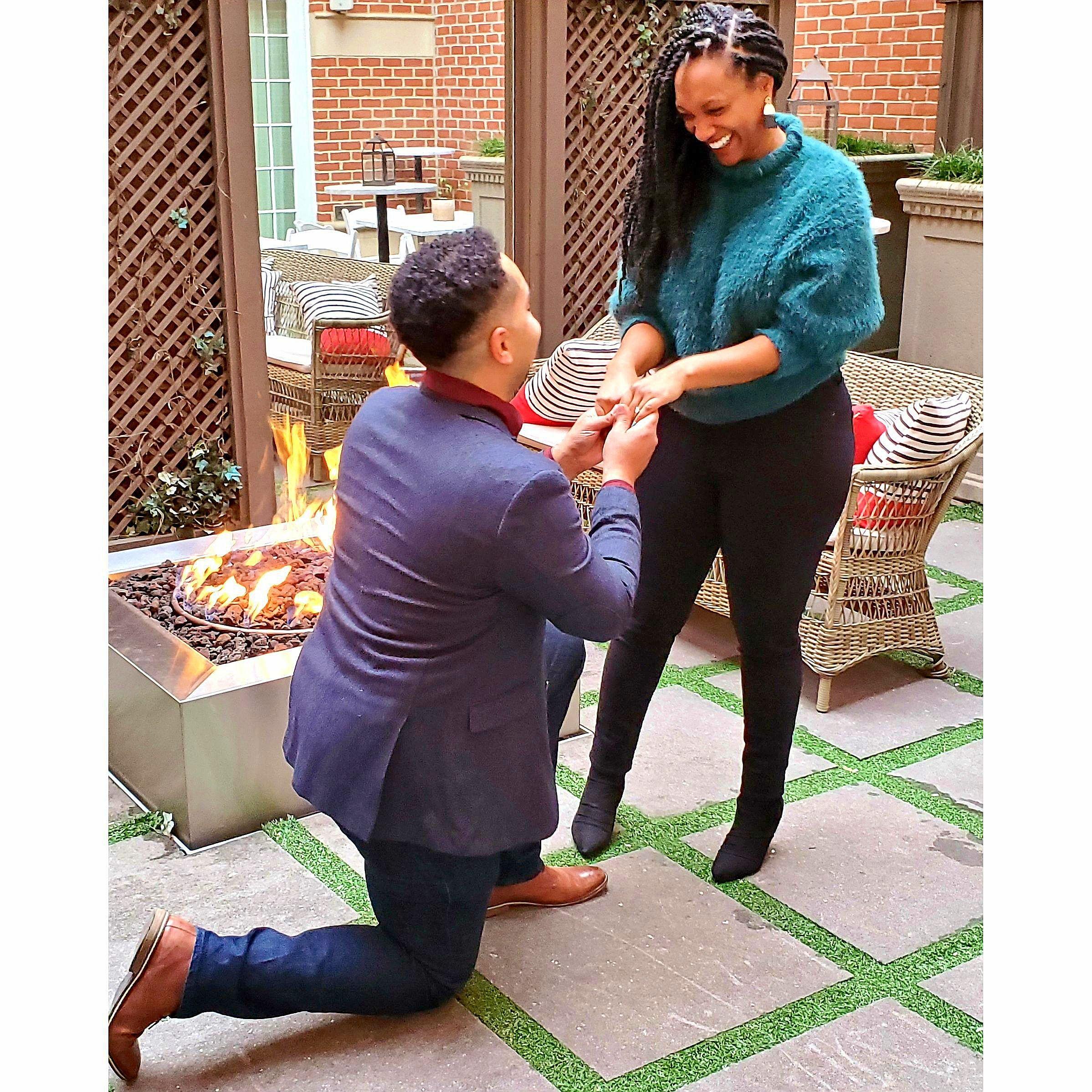 Reenacting the proposal in better lighting for the photographer and fam
