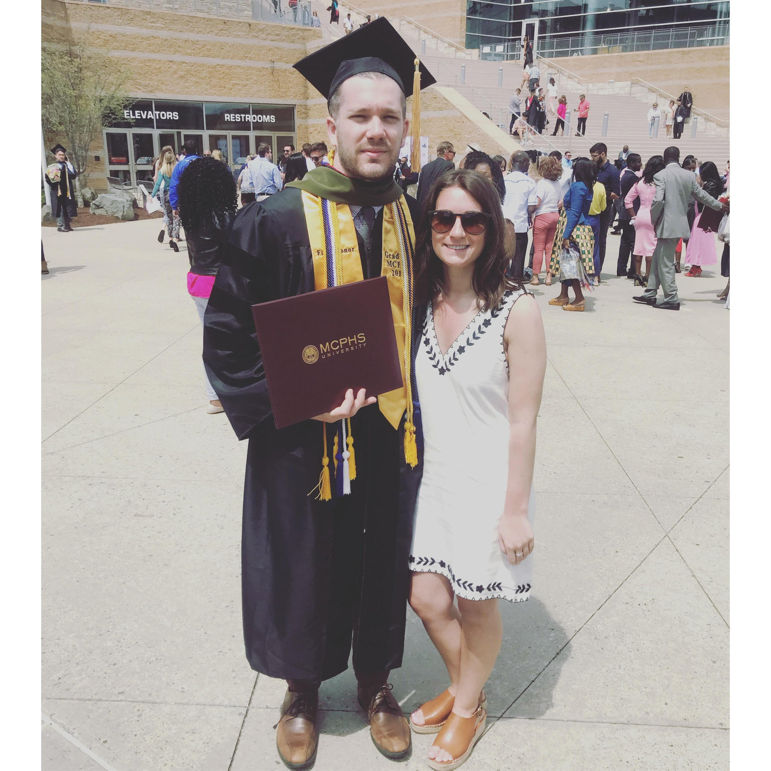 Drew graduating with his PharmD