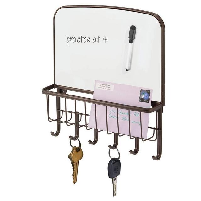 mDesign Metal Wall Mount Entryway Storage Organizer Mail Basket with Dry Erase Board, 6 Hooks - Holder for Letters, Magazines, Keys, Coats, Leashes - Strong Steel Wire Design - Bronze