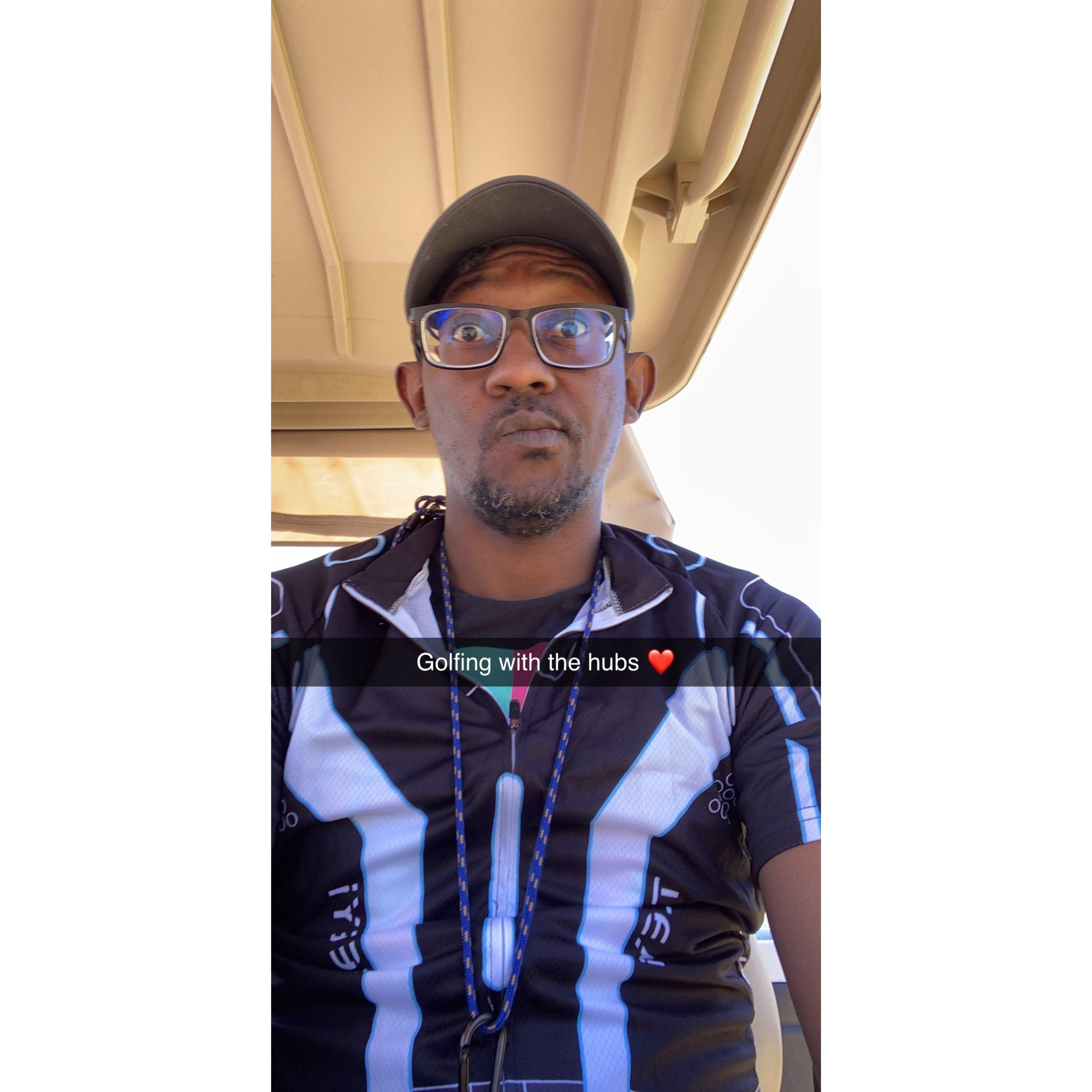 My first trip to the golf course with my hunk of man!