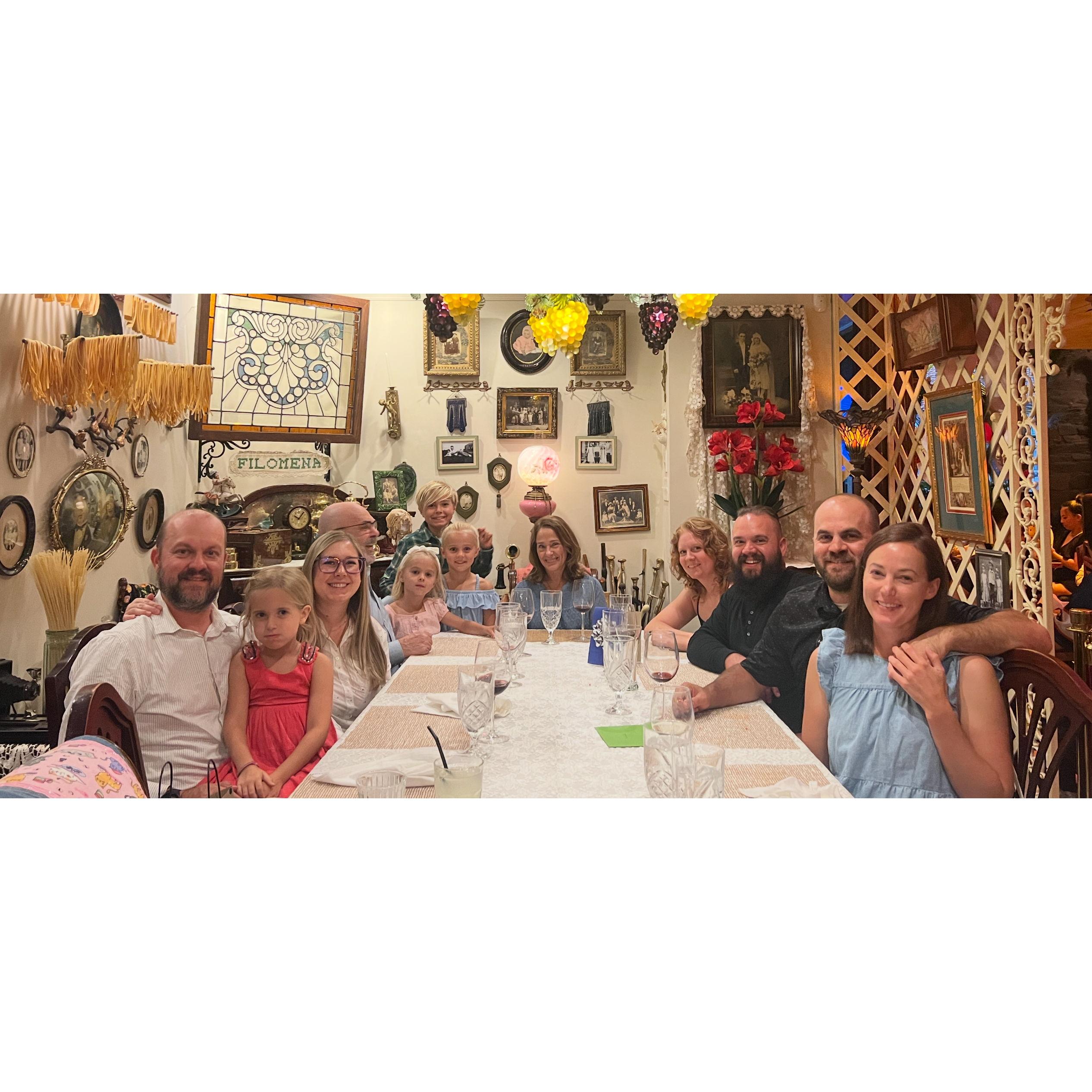 Tim's family celebrating Level VII