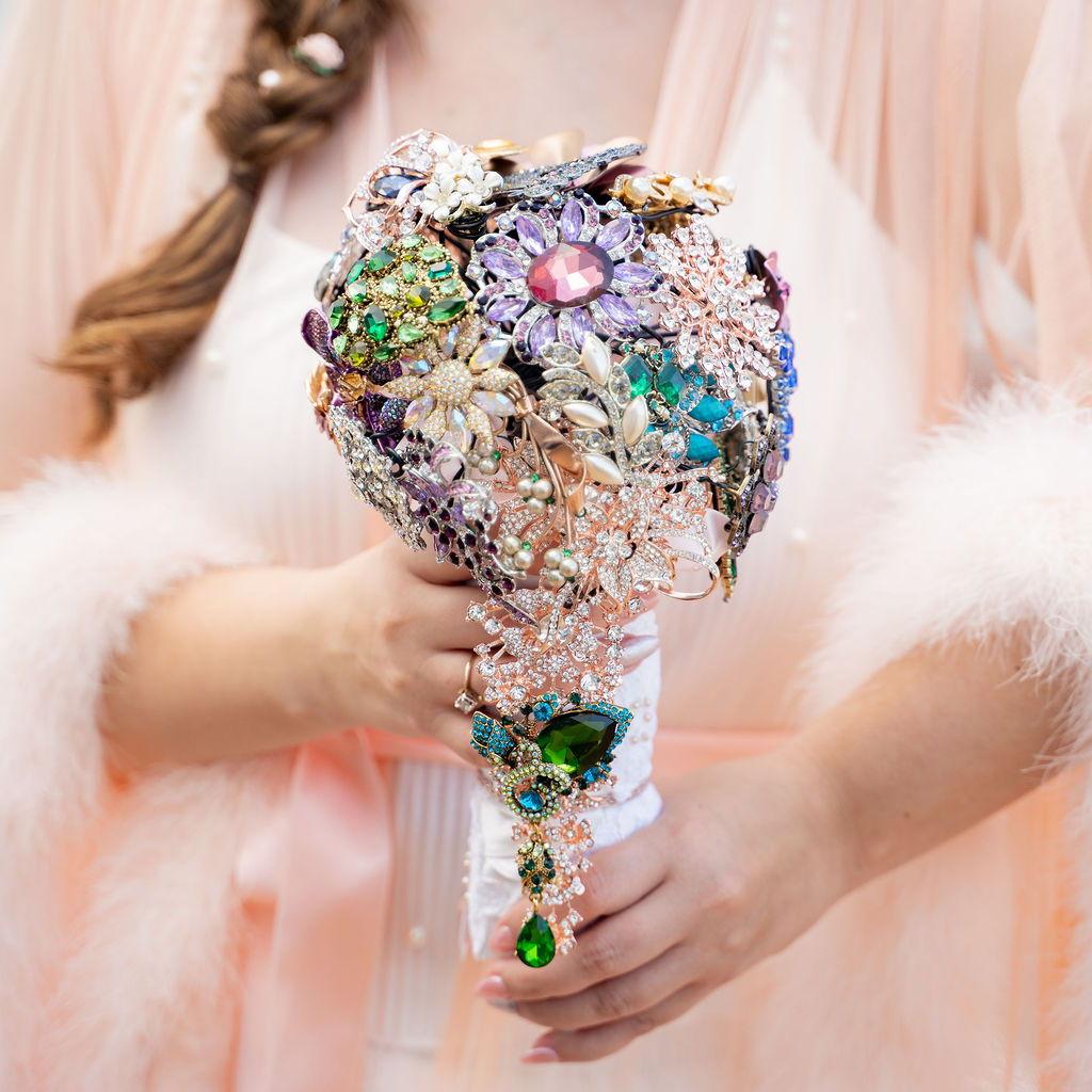 Close up of Alyssa's handmade bouquet. She and her mom made it from family brooches.