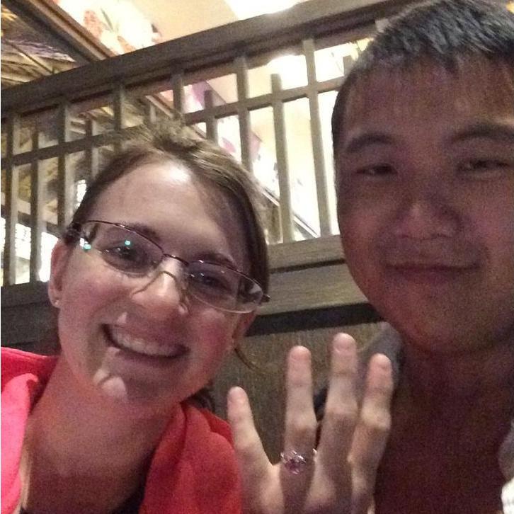 Leng and me realizing we did not take a picture after our engagement and quickly taking a candid photo to prove the deed was done.