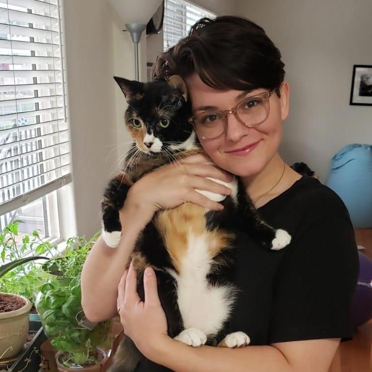 Ze'evi and our cat Turtle