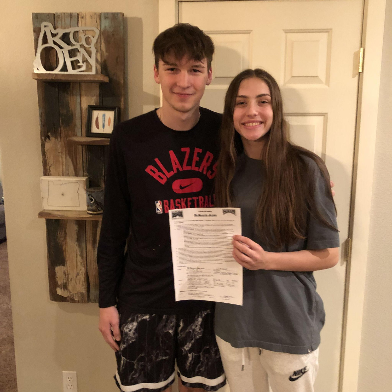 McKenzie signed her letter of intent to EOU, little did Ozzie know he would be applying shortly after
