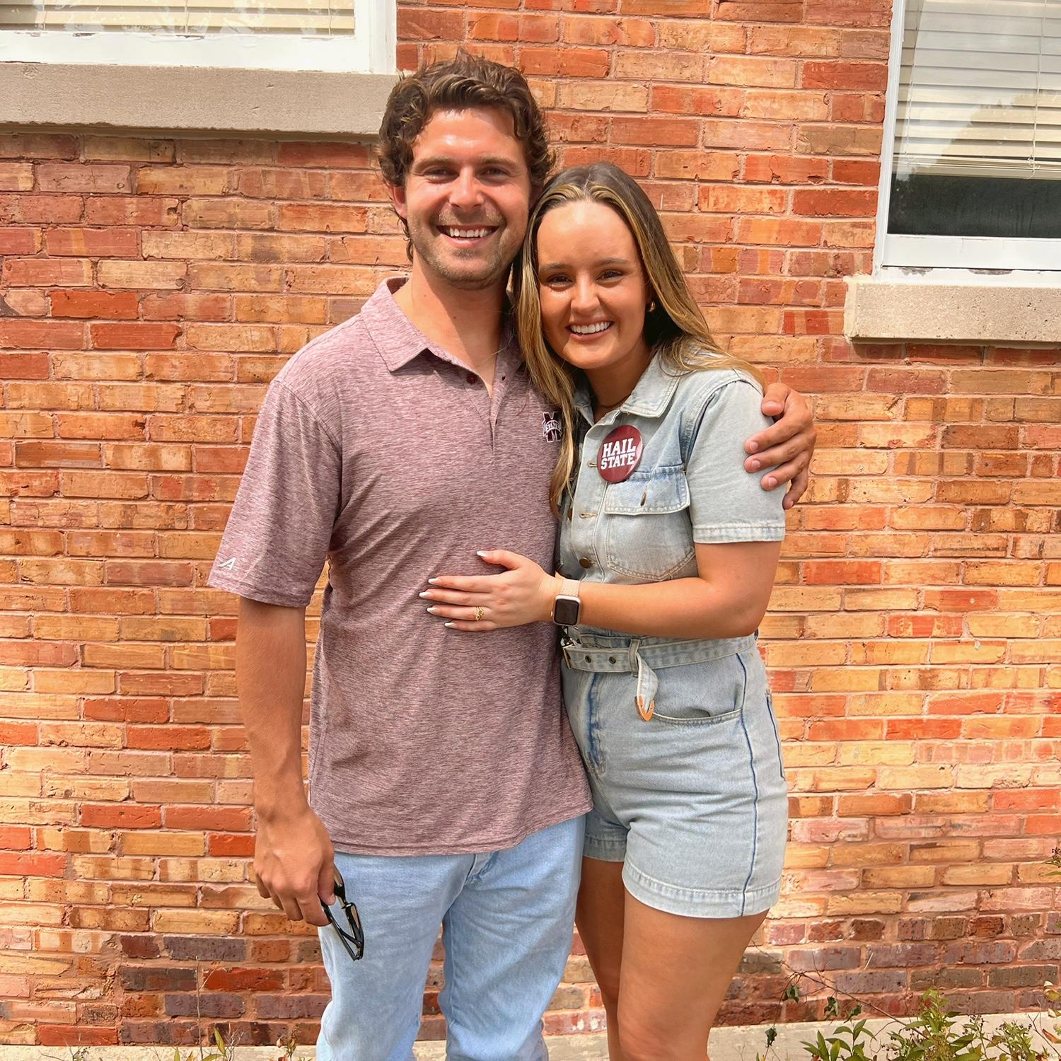 Somehow Evelyn was able to weasel Travis into wearin MSU Maroon😜