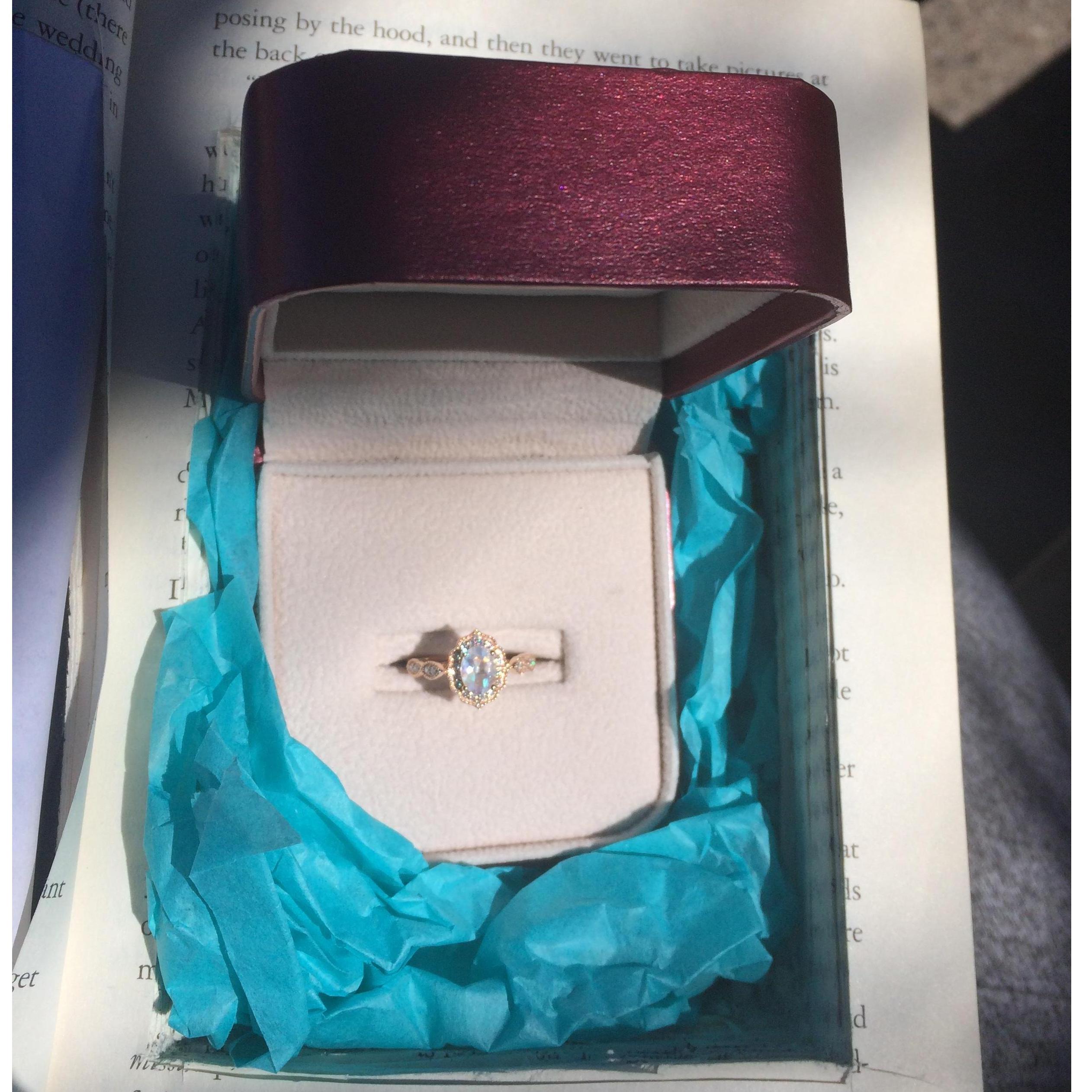 The ring box inside the carved out book. It was pretty clever.