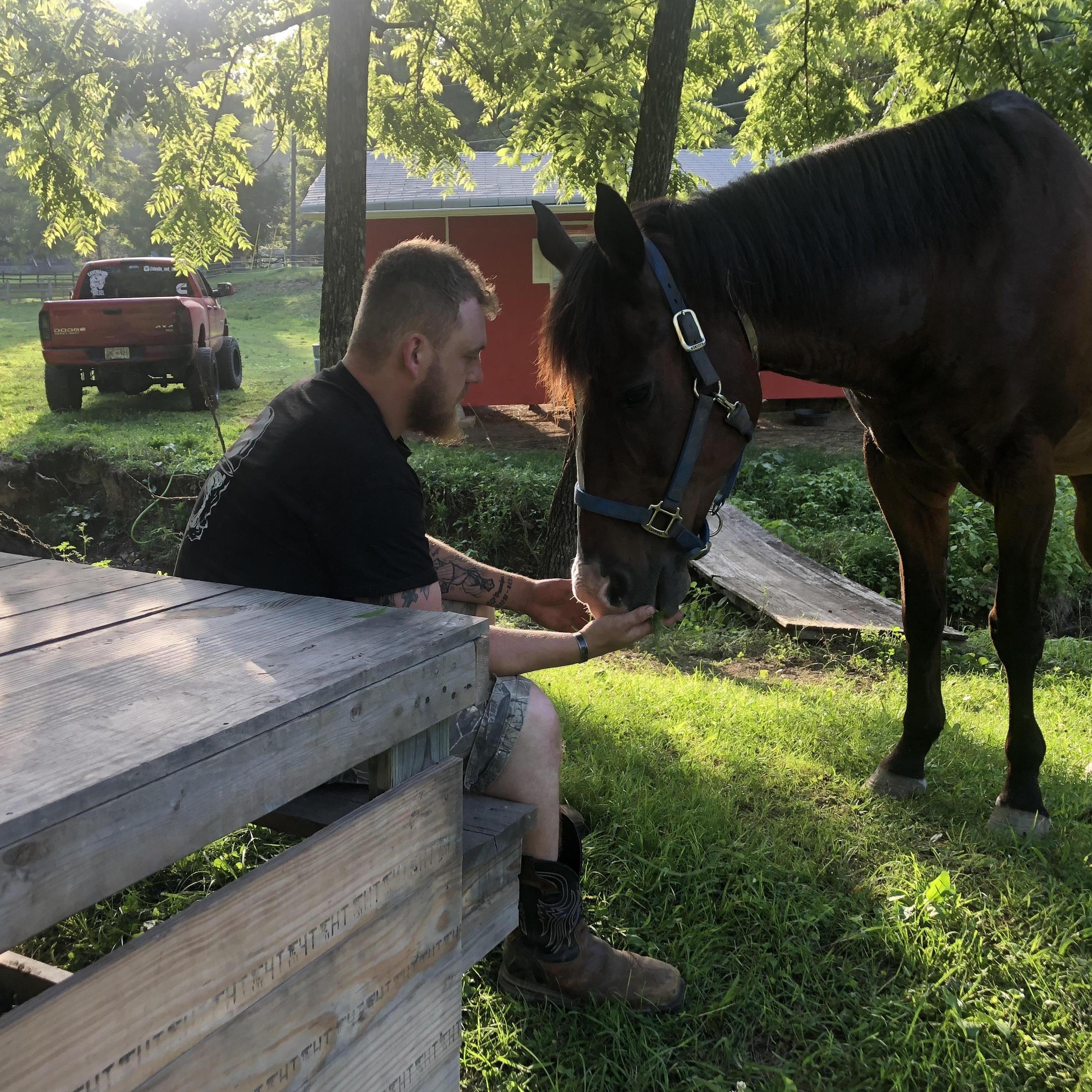 Ian bonding with his horse "Slim Jim"