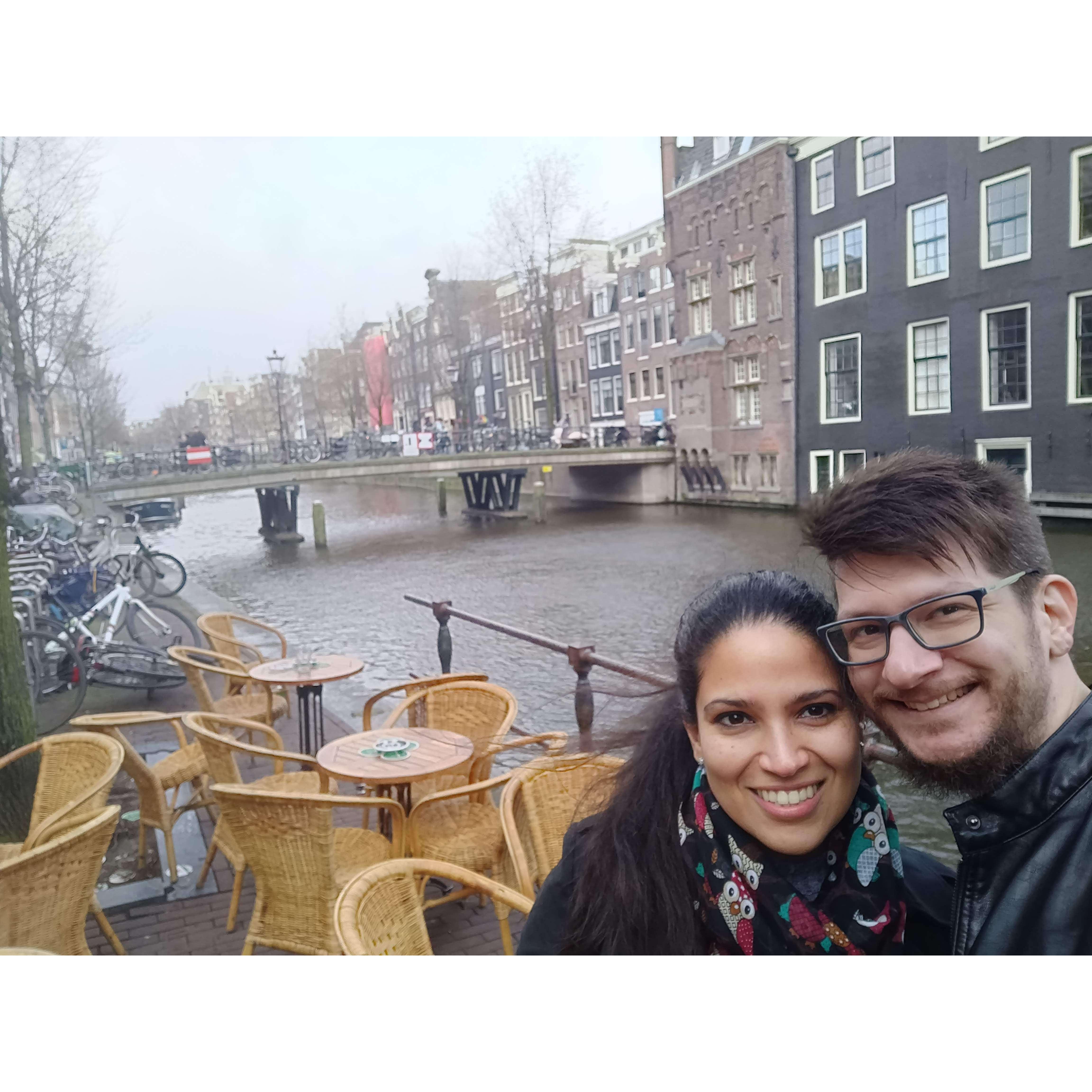 Amsterdaming around the canals (ignore the chairs - we were too cold to retake this one)!