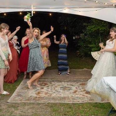 Catching the bouquet at my niece, Emma's wedding-- oh yeah!