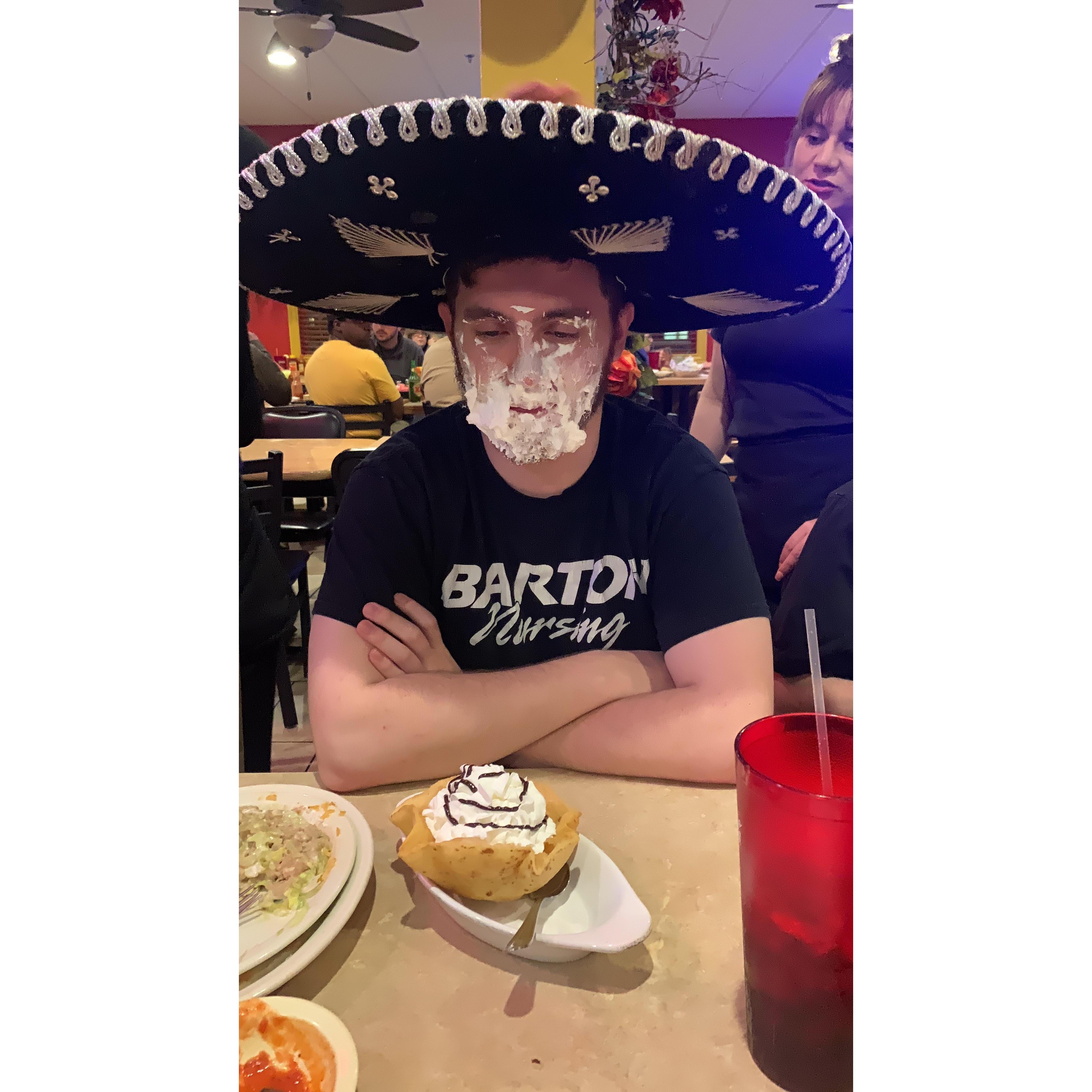 Jordan getting "pied in the face" for his birthday at Playa Azul.