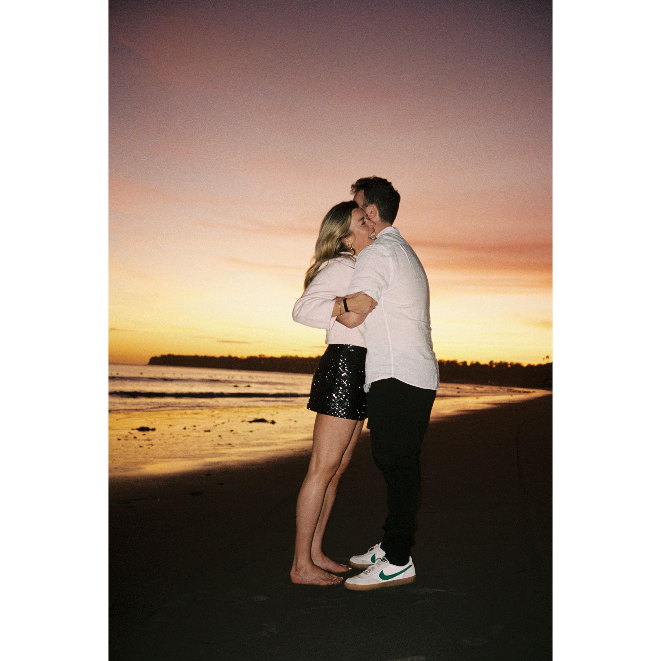 Giggling on the beach.