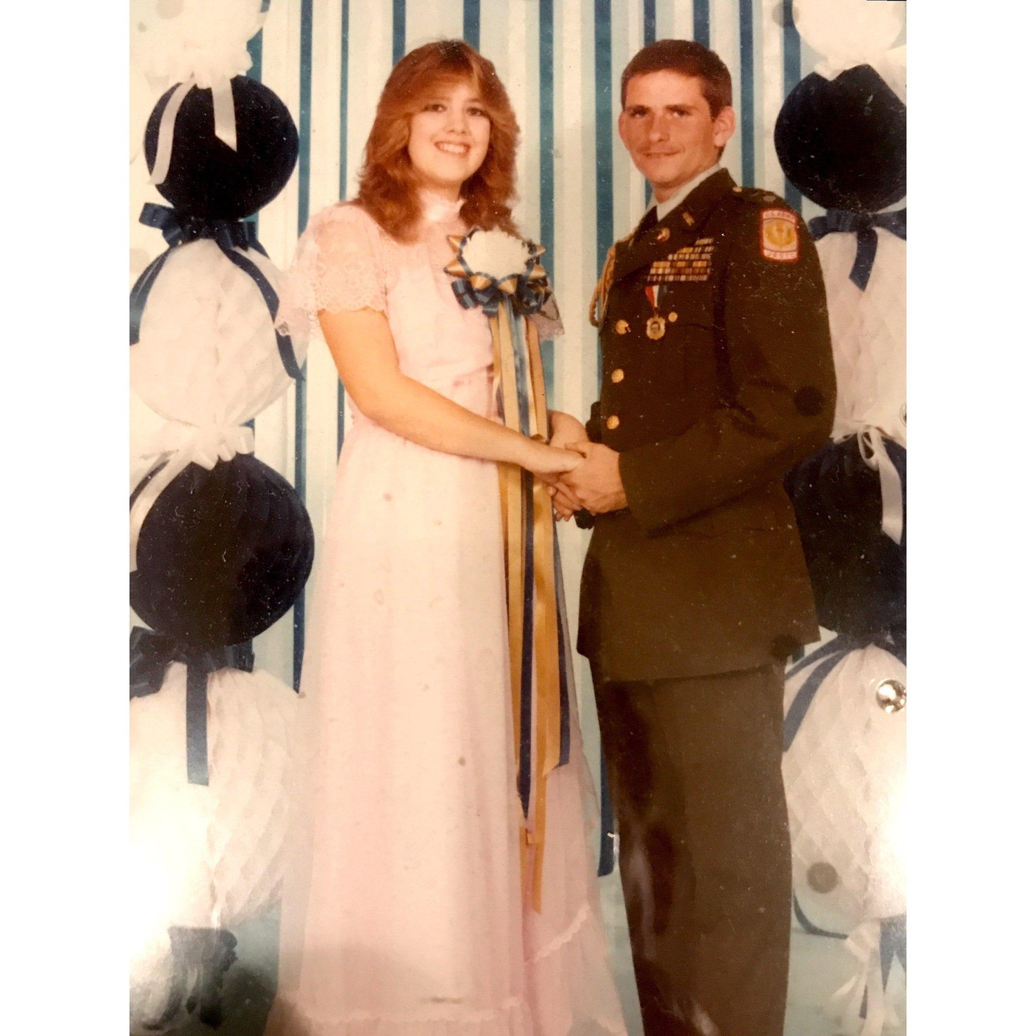 Us in high school at our Homecoming dance.