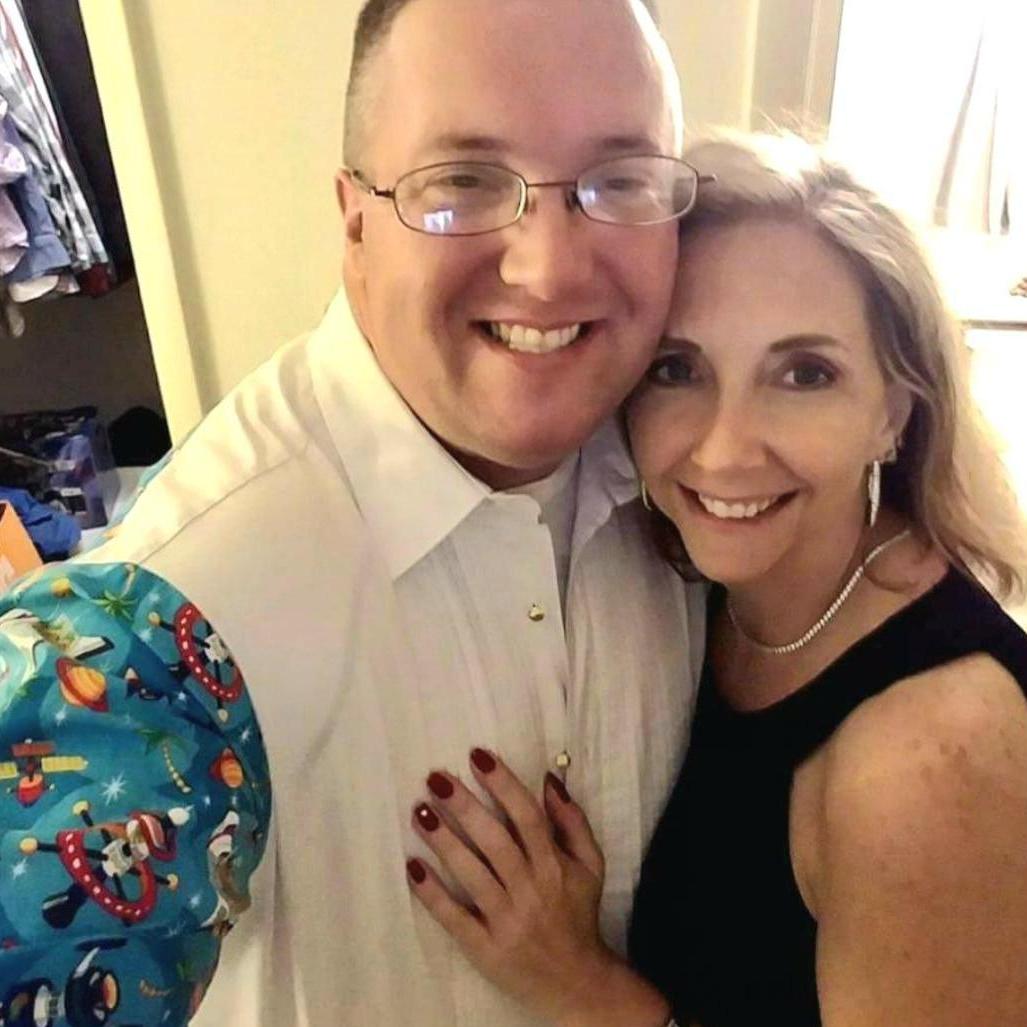 After Kristin's first Navy Ball, she got to see my party sleeves hidden beneath my uniform tux jacket.  Yes, it's little rocket ships.  Look how elegant my lady is, though....